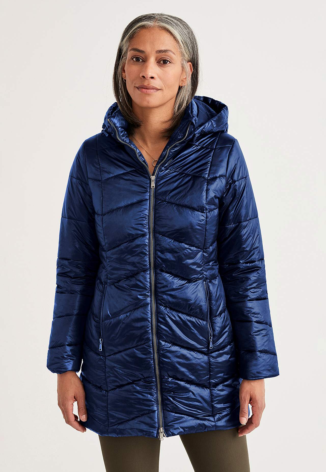 Padded jacket with shimmering fabric