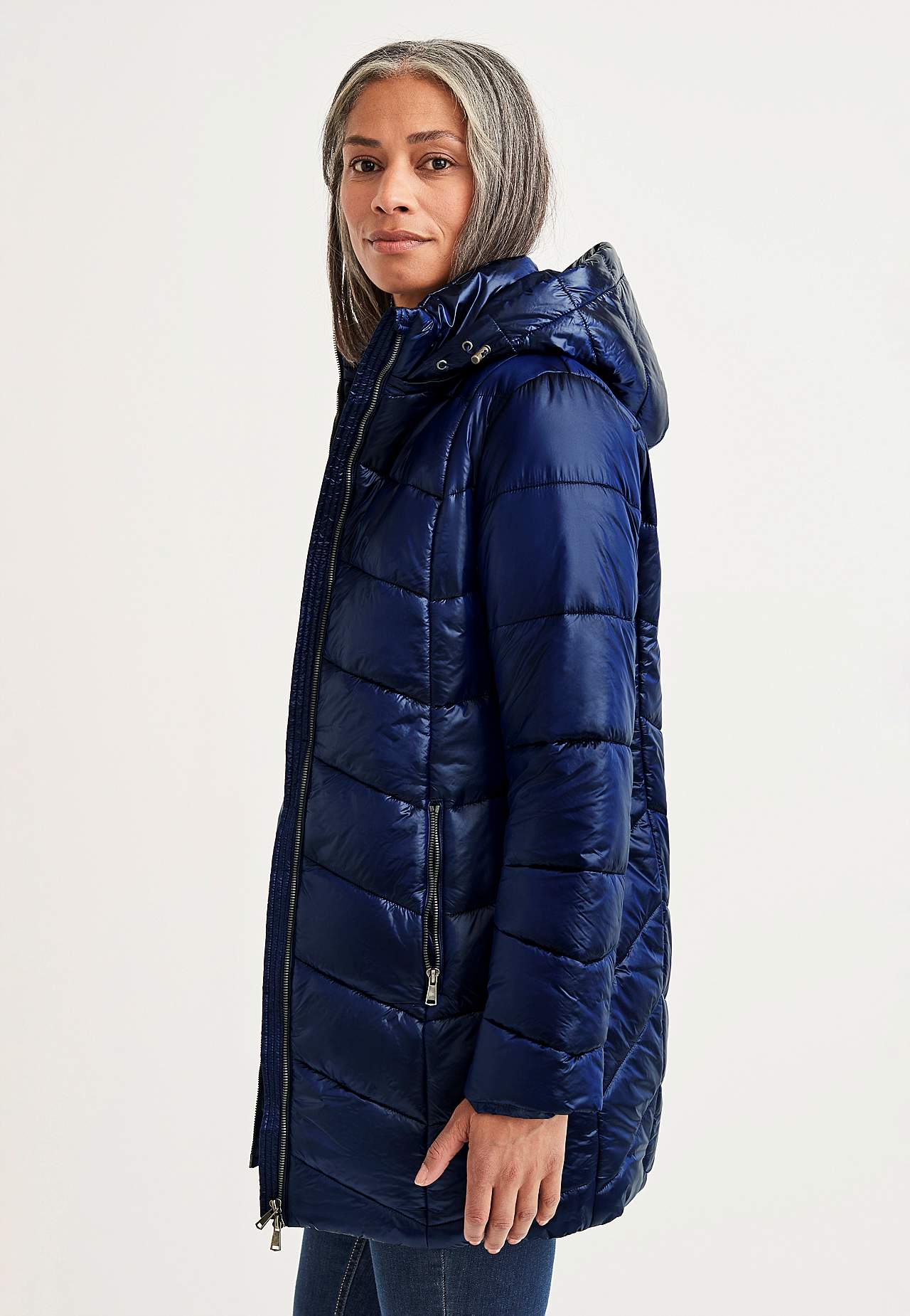Padded jacket with shimmering fabric