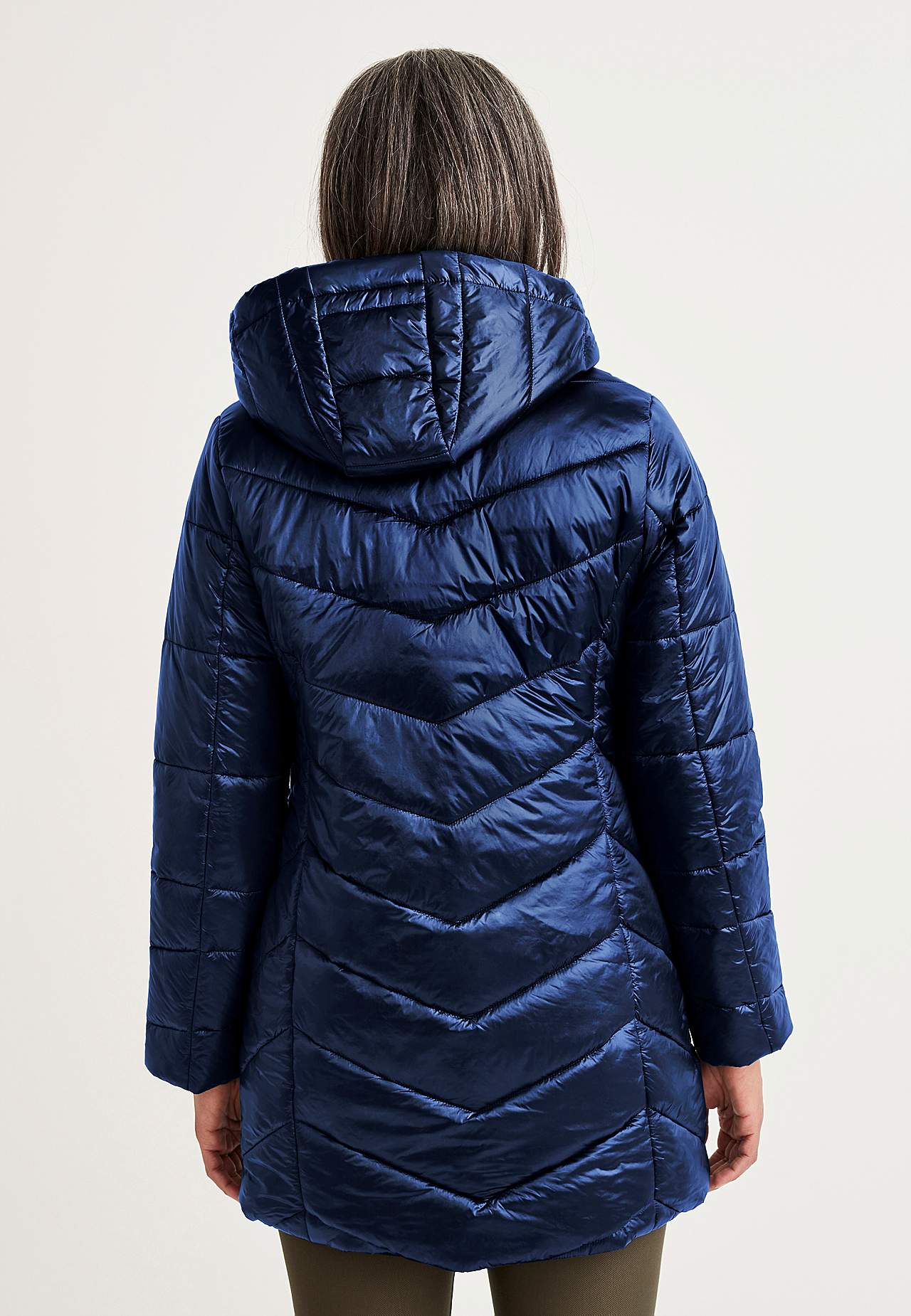 Padded jacket with shimmering fabric