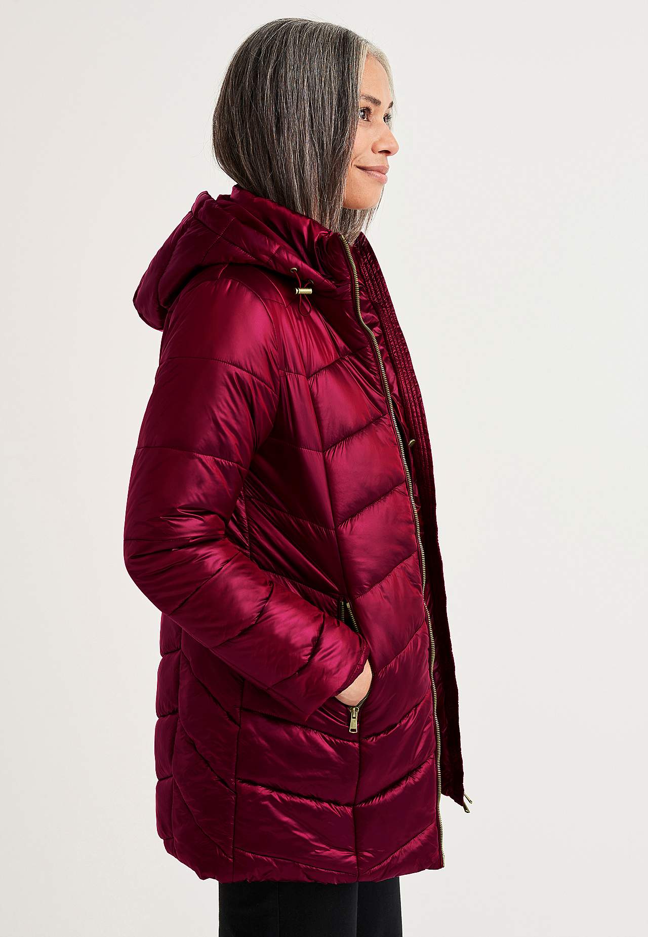 Padded jacket with shimmering fabric
