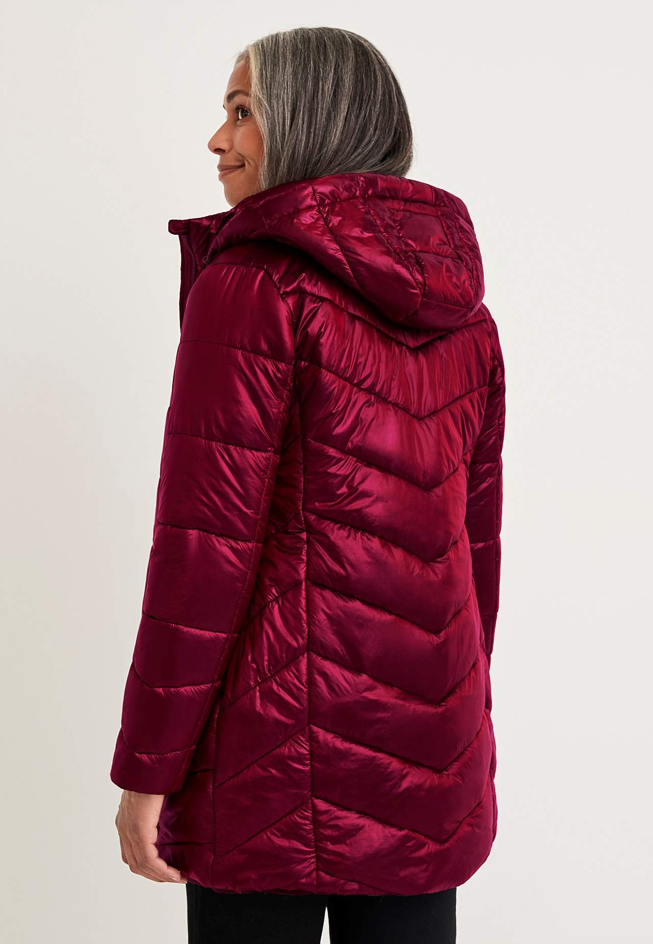 Padded jacket with shimmering fabric