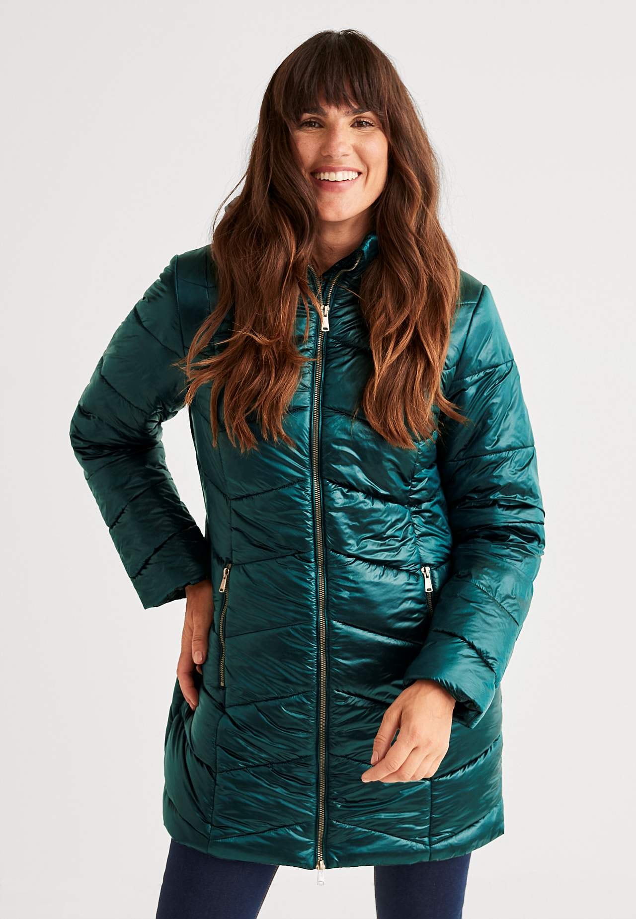 Padded jacket with shimmering fabric
