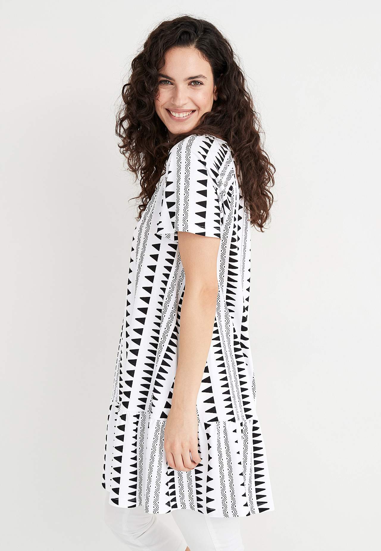 Tunic with frill at the bottom