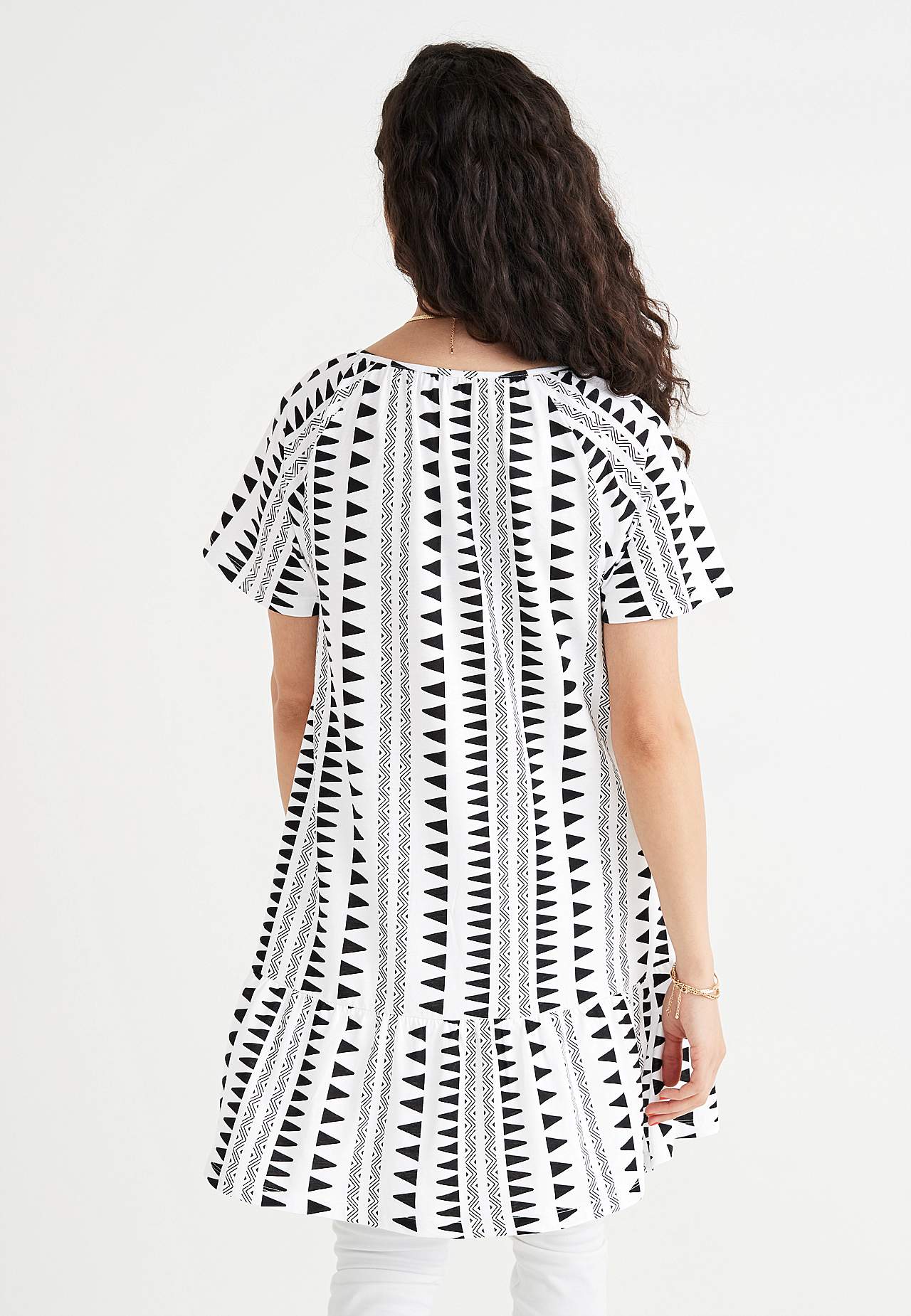 Tunic with frill at the bottom