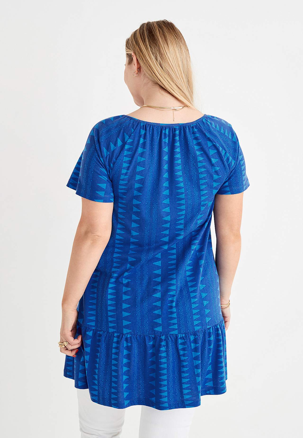 Tunic with frill at the bottom