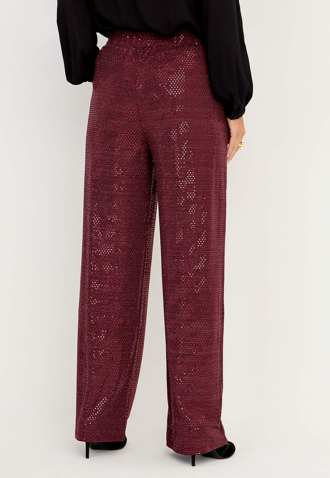 Party trousers with paillettes