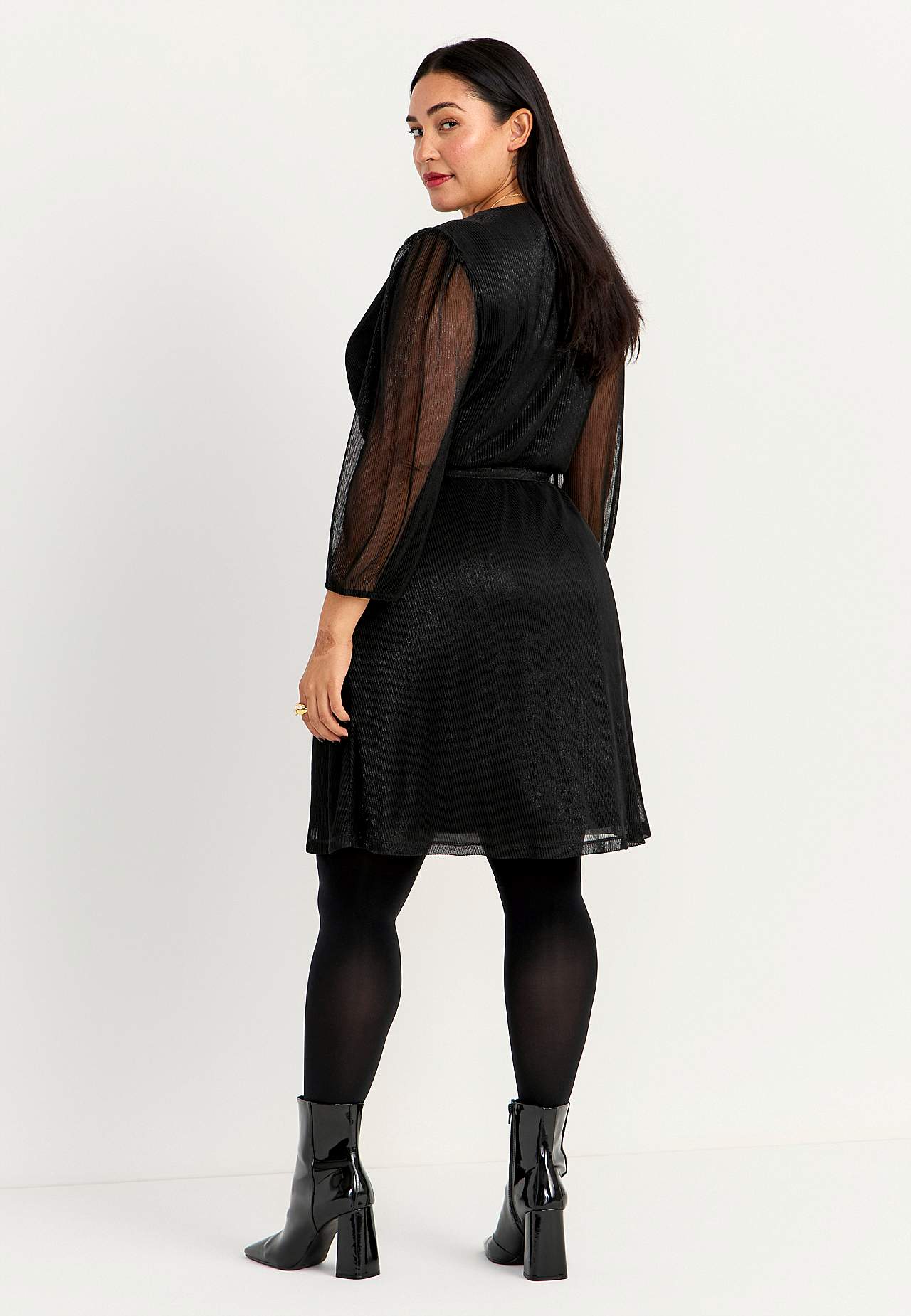 Glittery party dress with overlap design