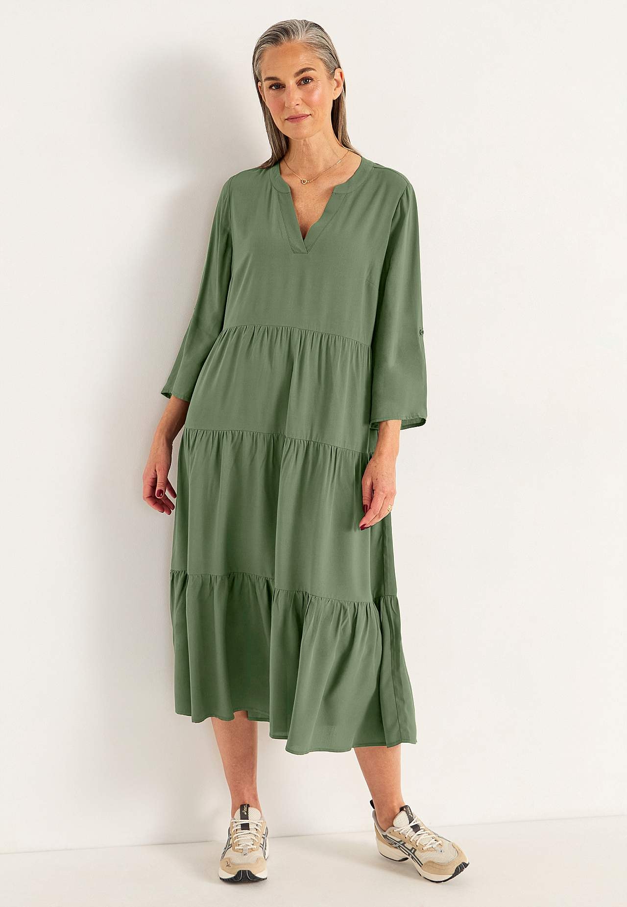 Dress with flounces