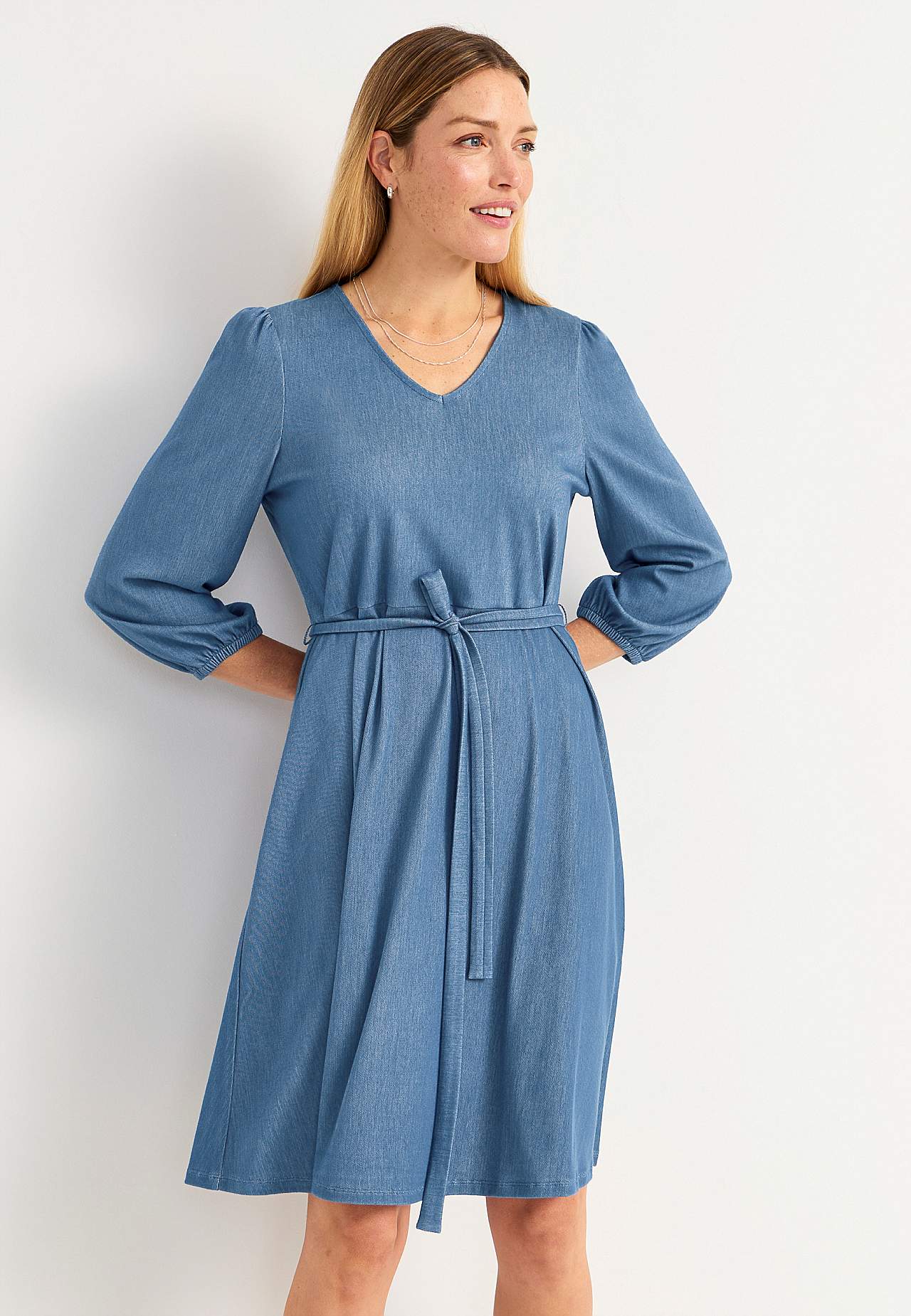 Dress in denim jersey with self-tie belt