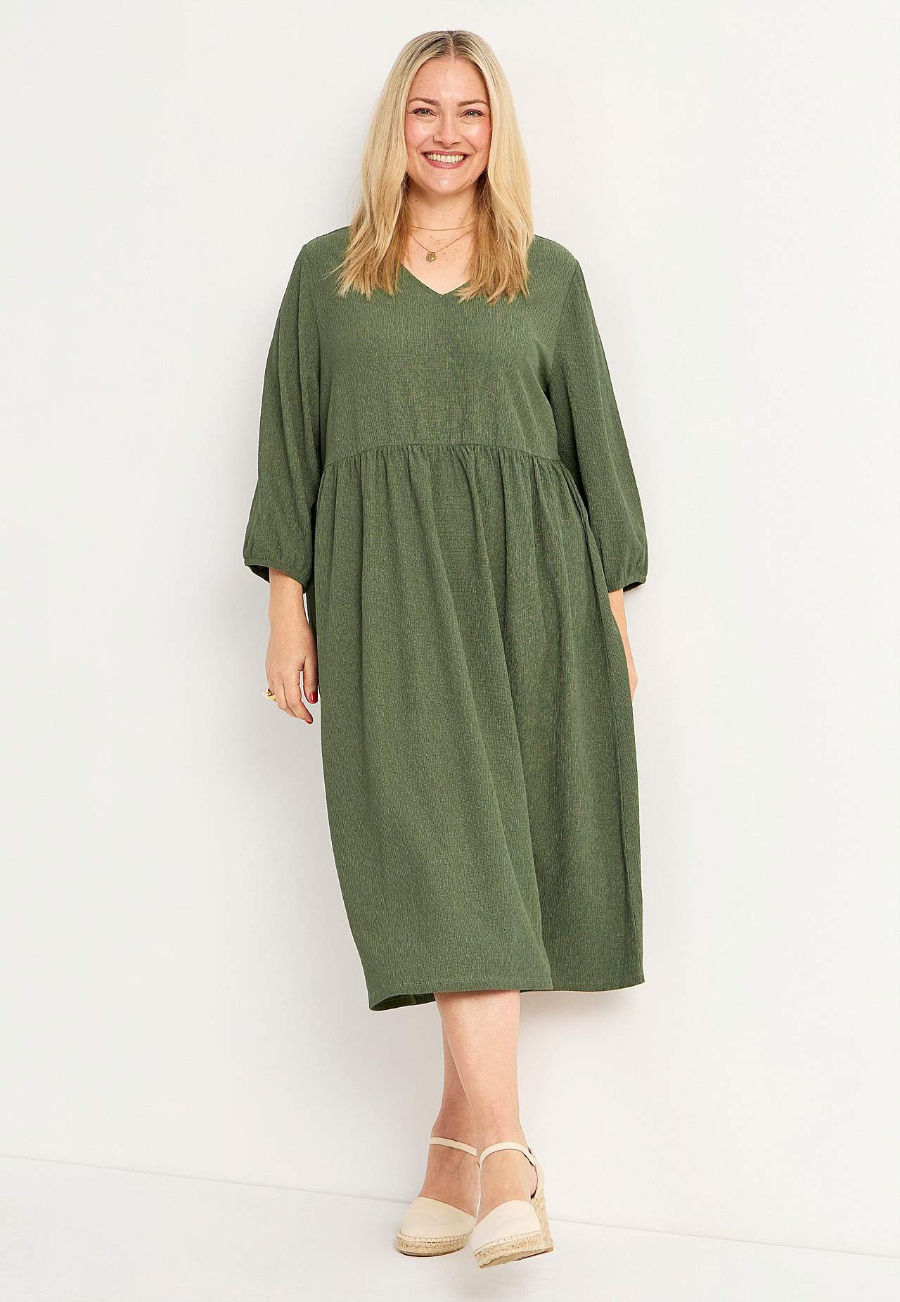 Jersey dress with structural pattern