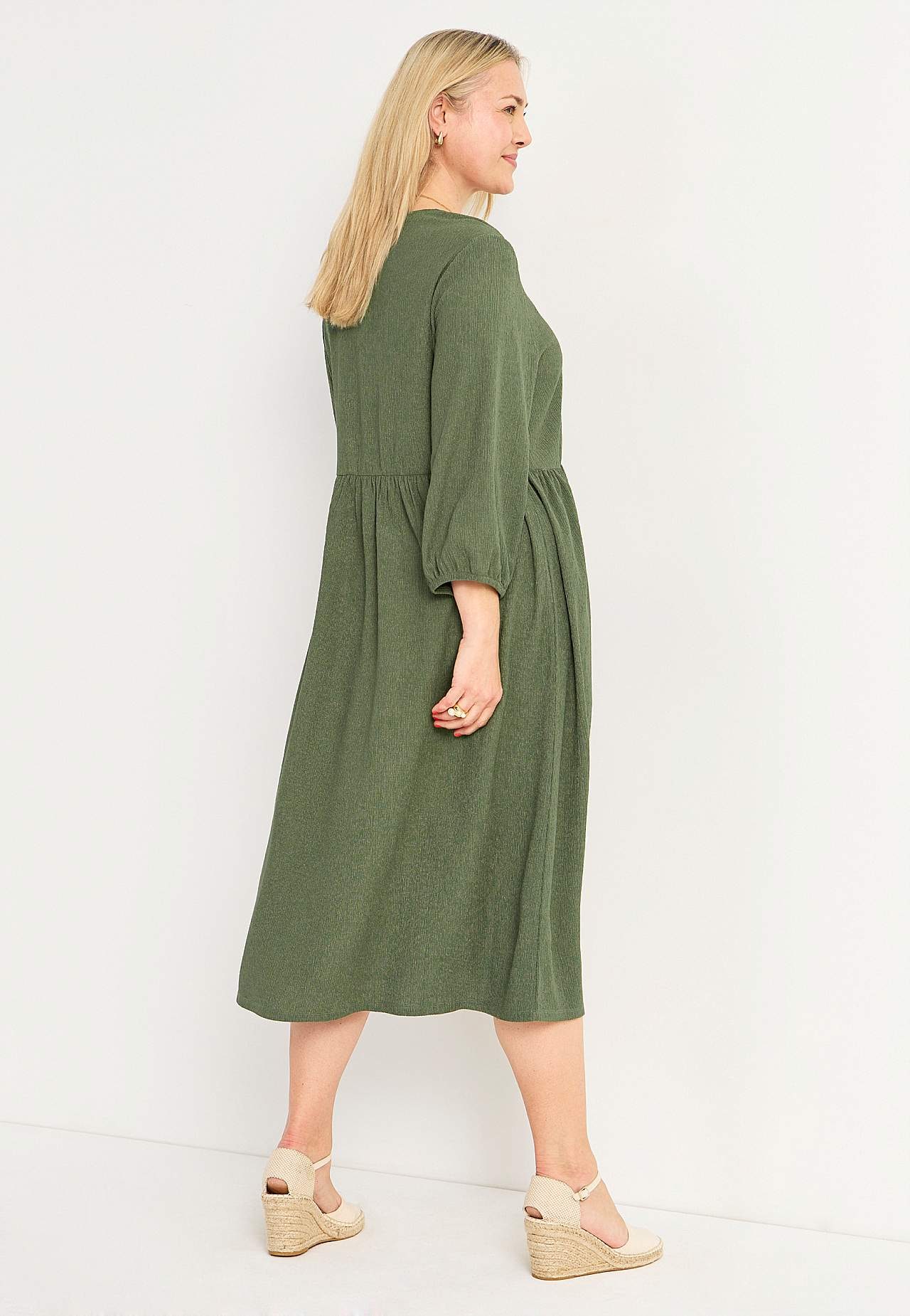 Jersey dress with structural pattern