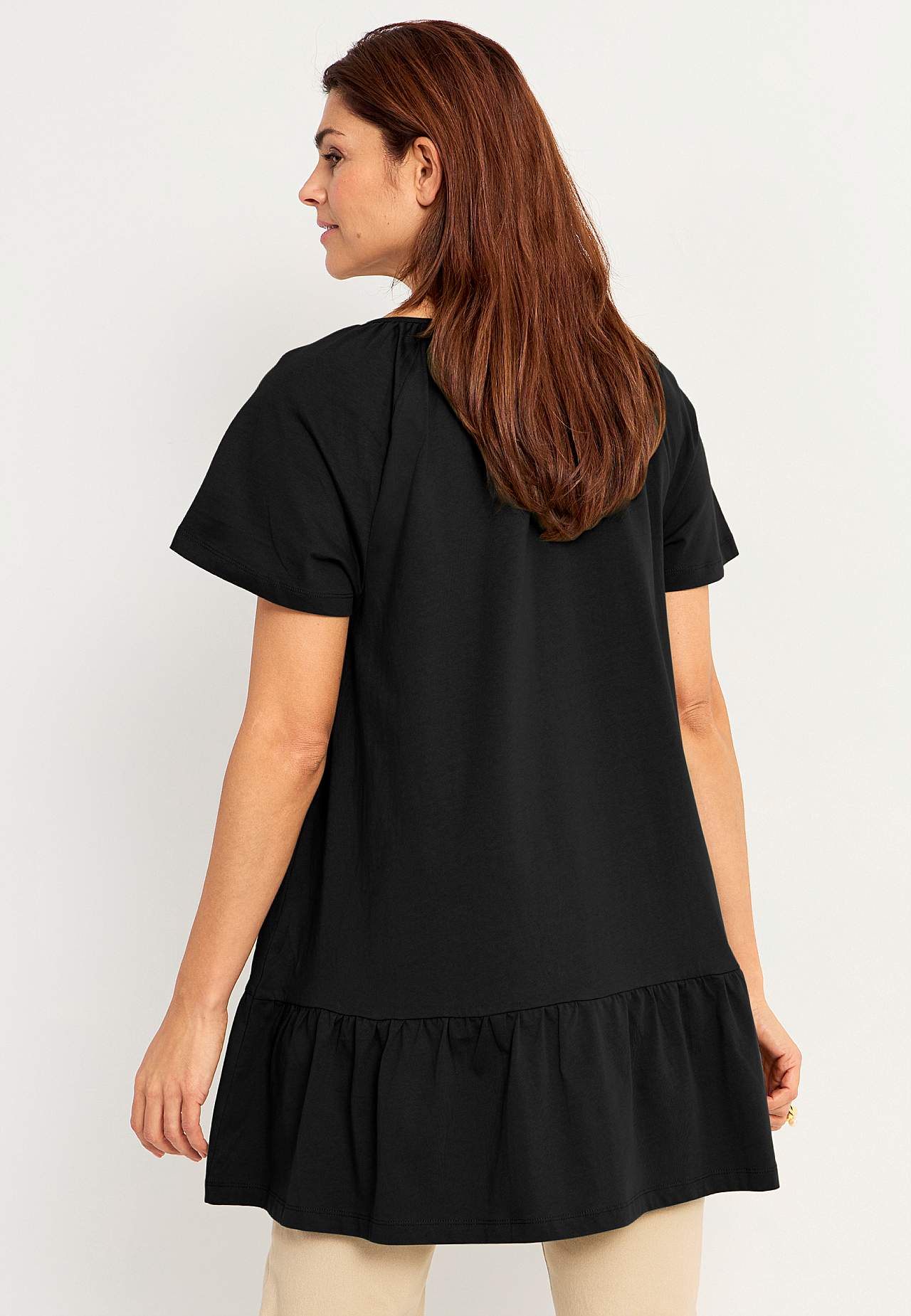 Tunic with frill at the bottom