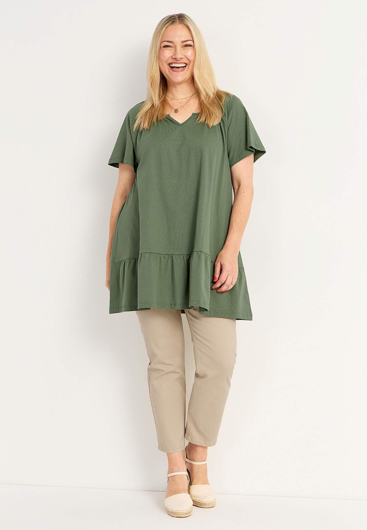 Tunic with frill at the bottom