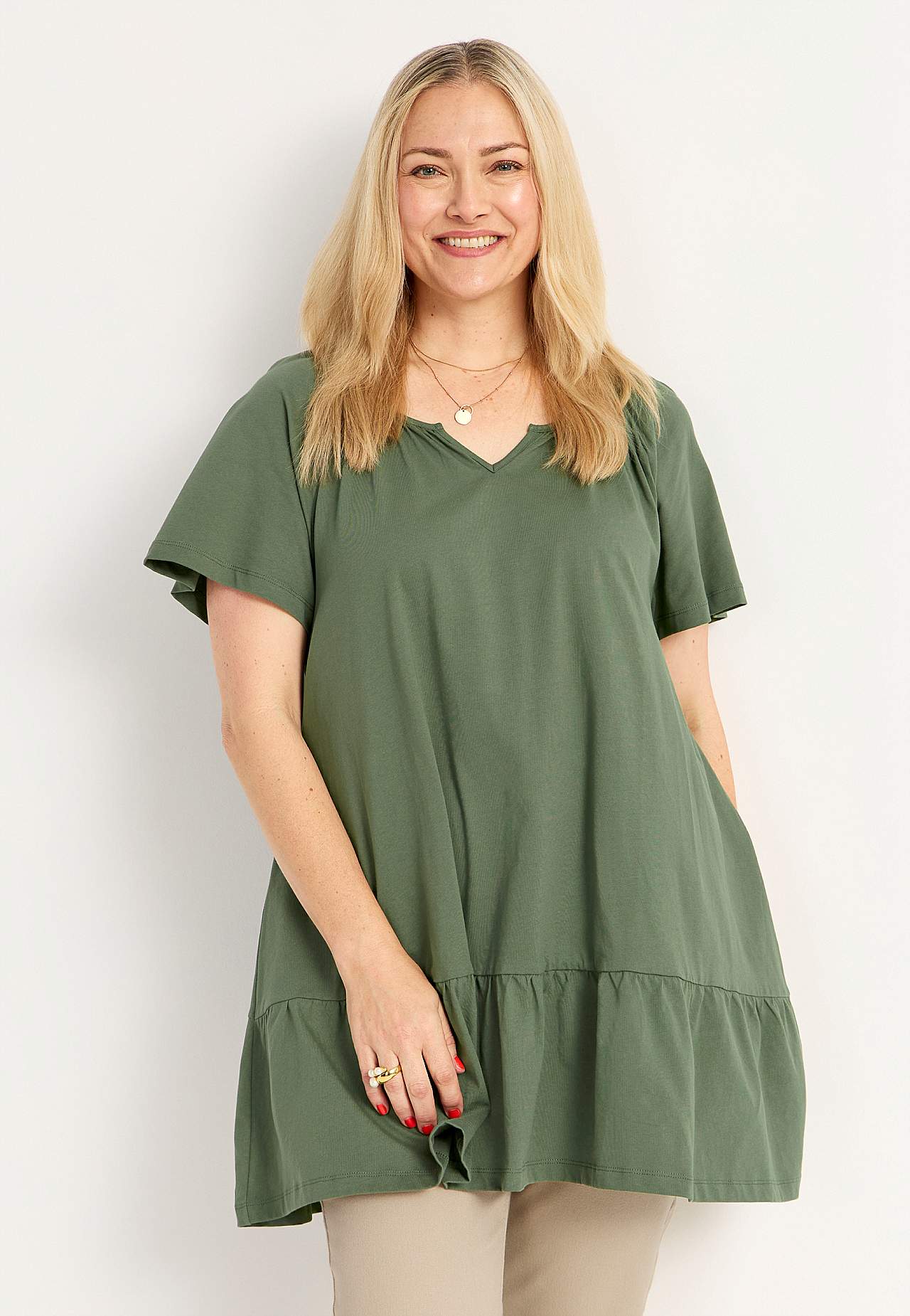 Tunic with frill at the bottom