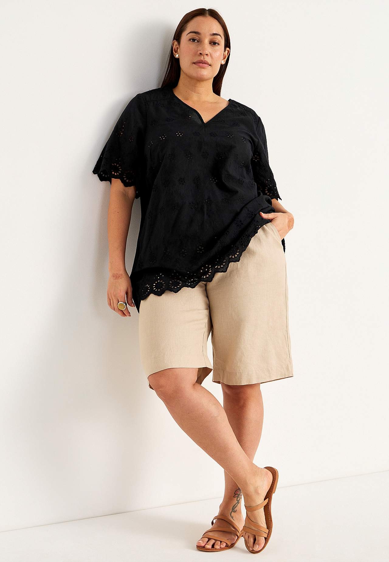 Tunic with hole embroidery