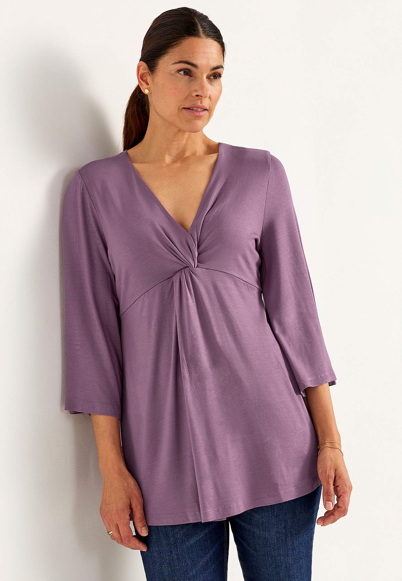 V-neck tunic with twisted gathering