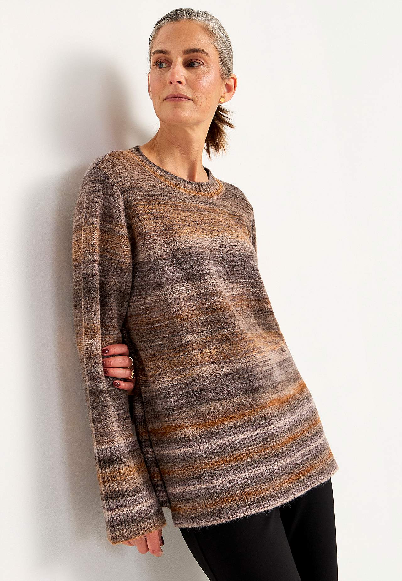 Knitted, multi coloured sweater