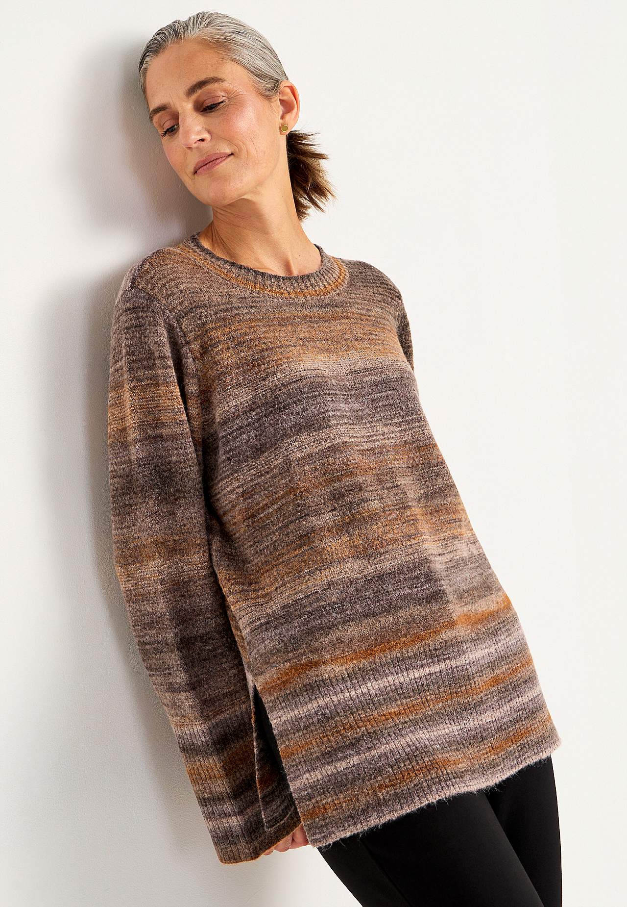 Knitted, multi coloured sweater