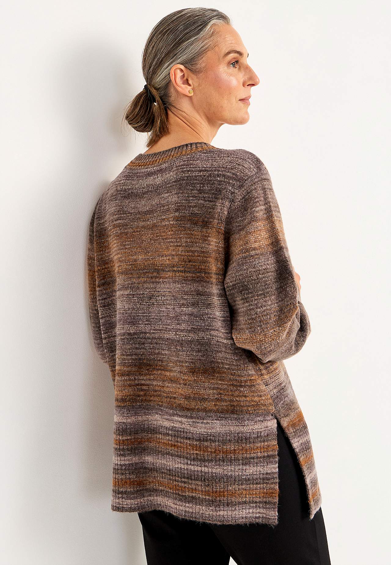 Knitted, multi coloured sweater