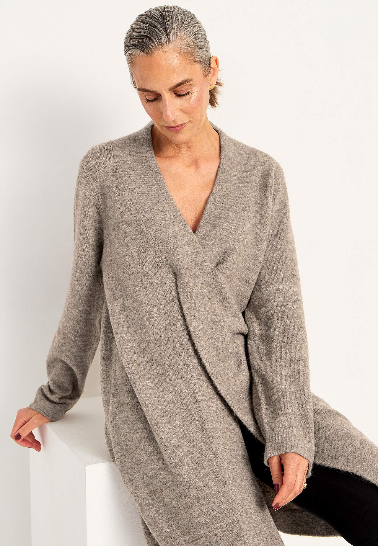 Knitted tunic with twisted detail