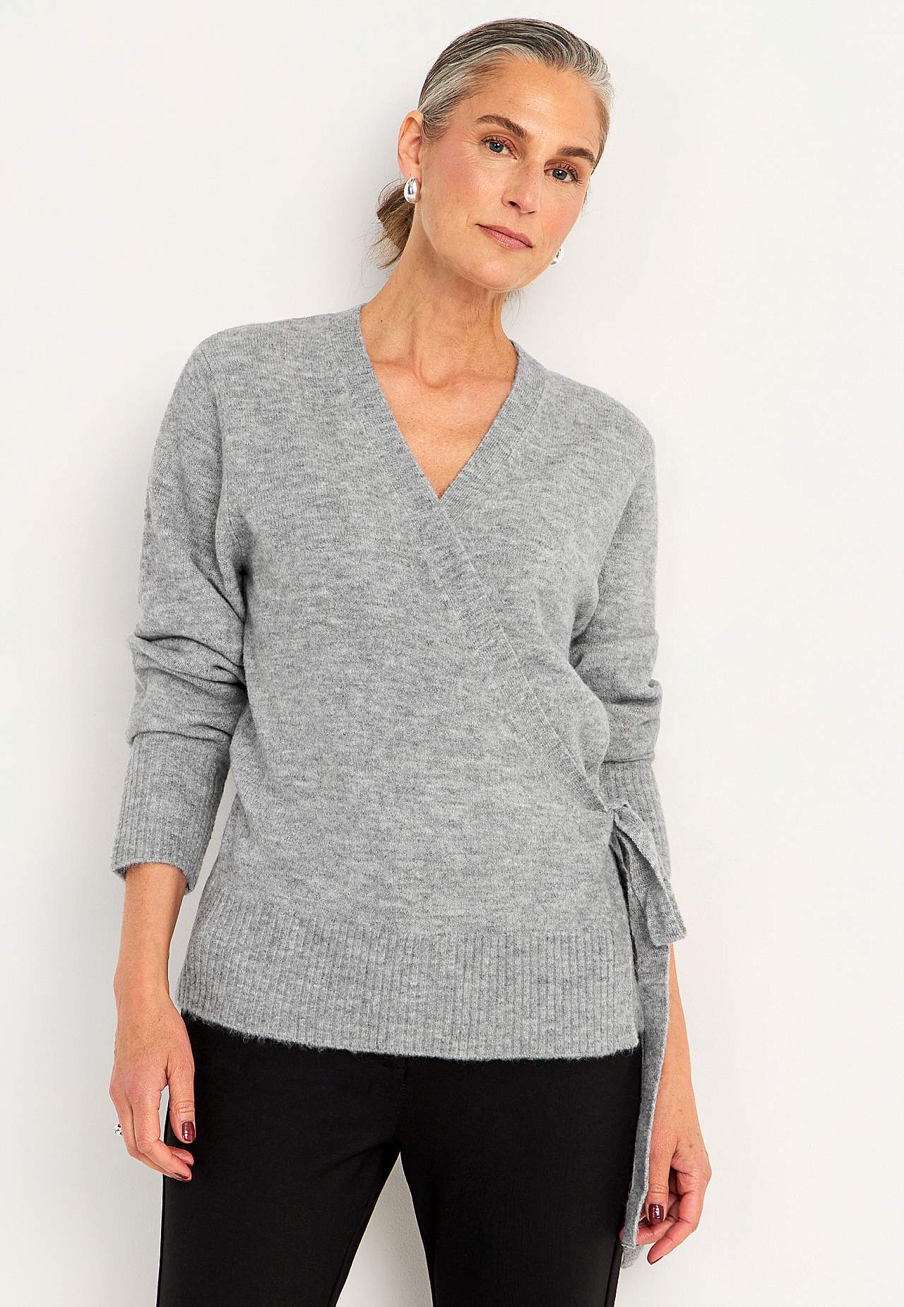 Knitted cardigan with wrap design