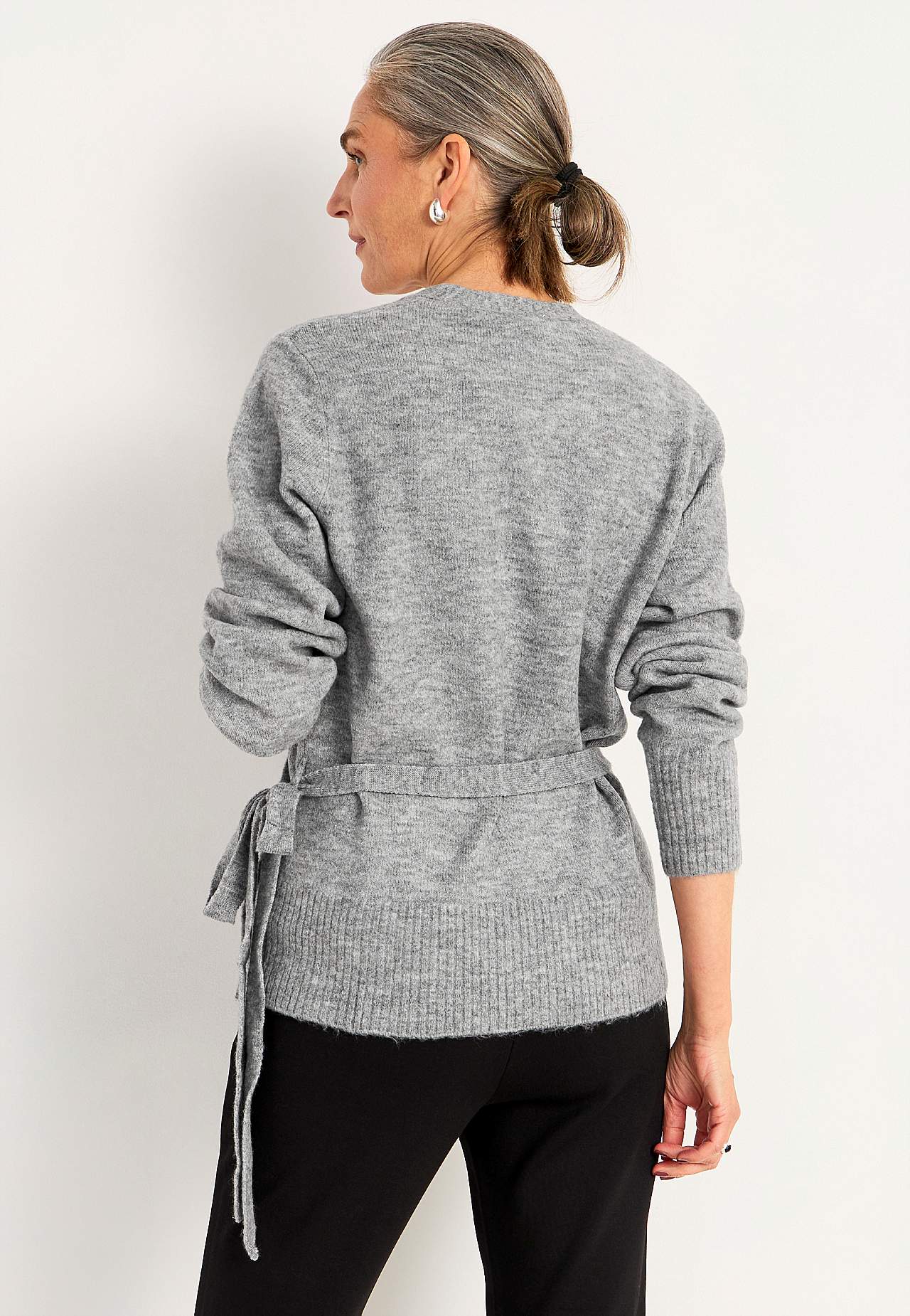 Knitted cardigan with wrap design