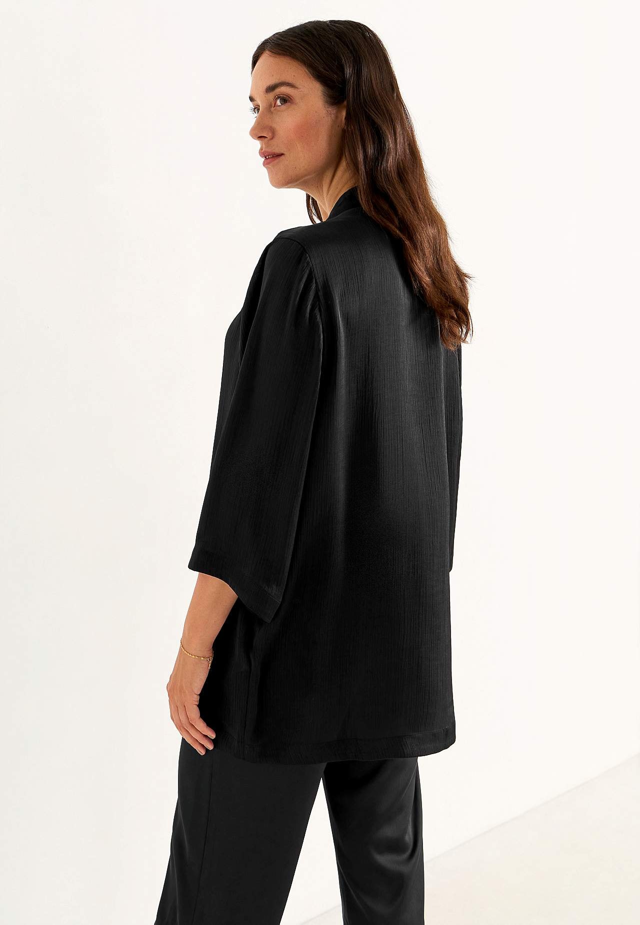 Open party tunic with gold coloured buckle
