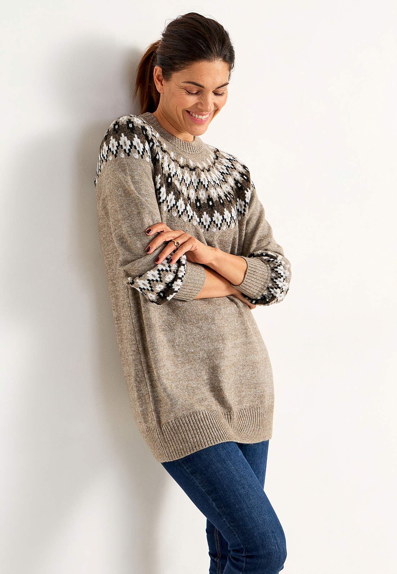 Knitted, jacquard patterned sweater