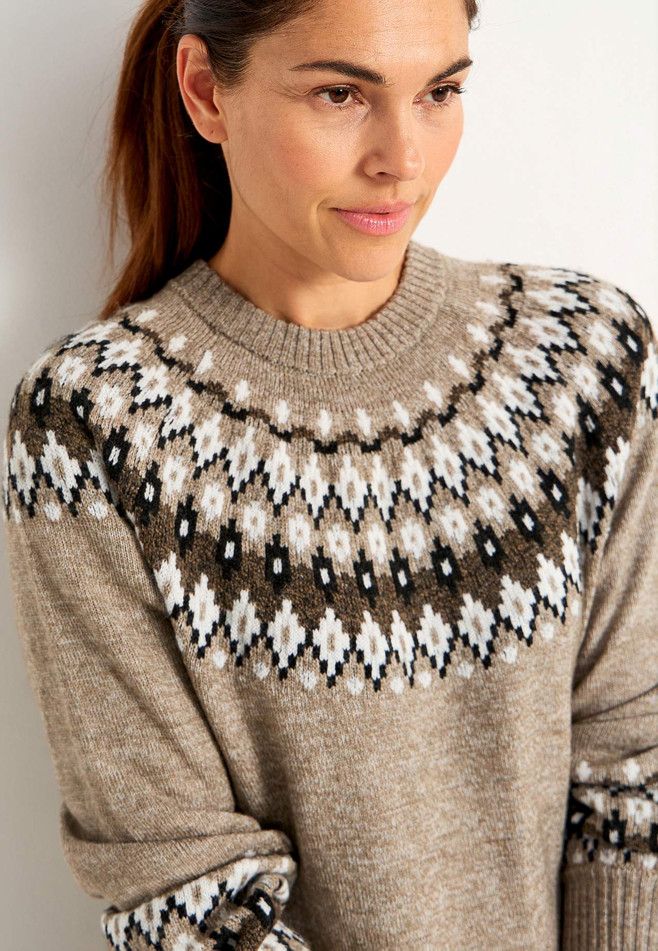 Knitted, jacquard patterned sweater