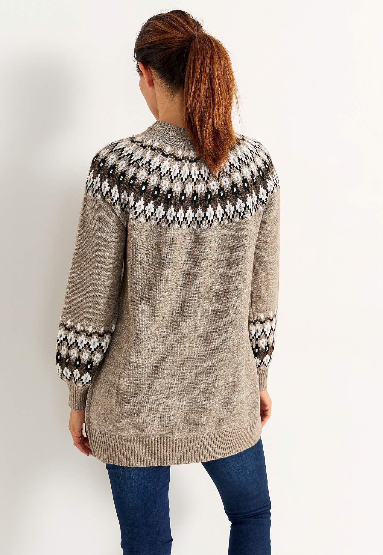 Knitted, jacquard patterned sweater