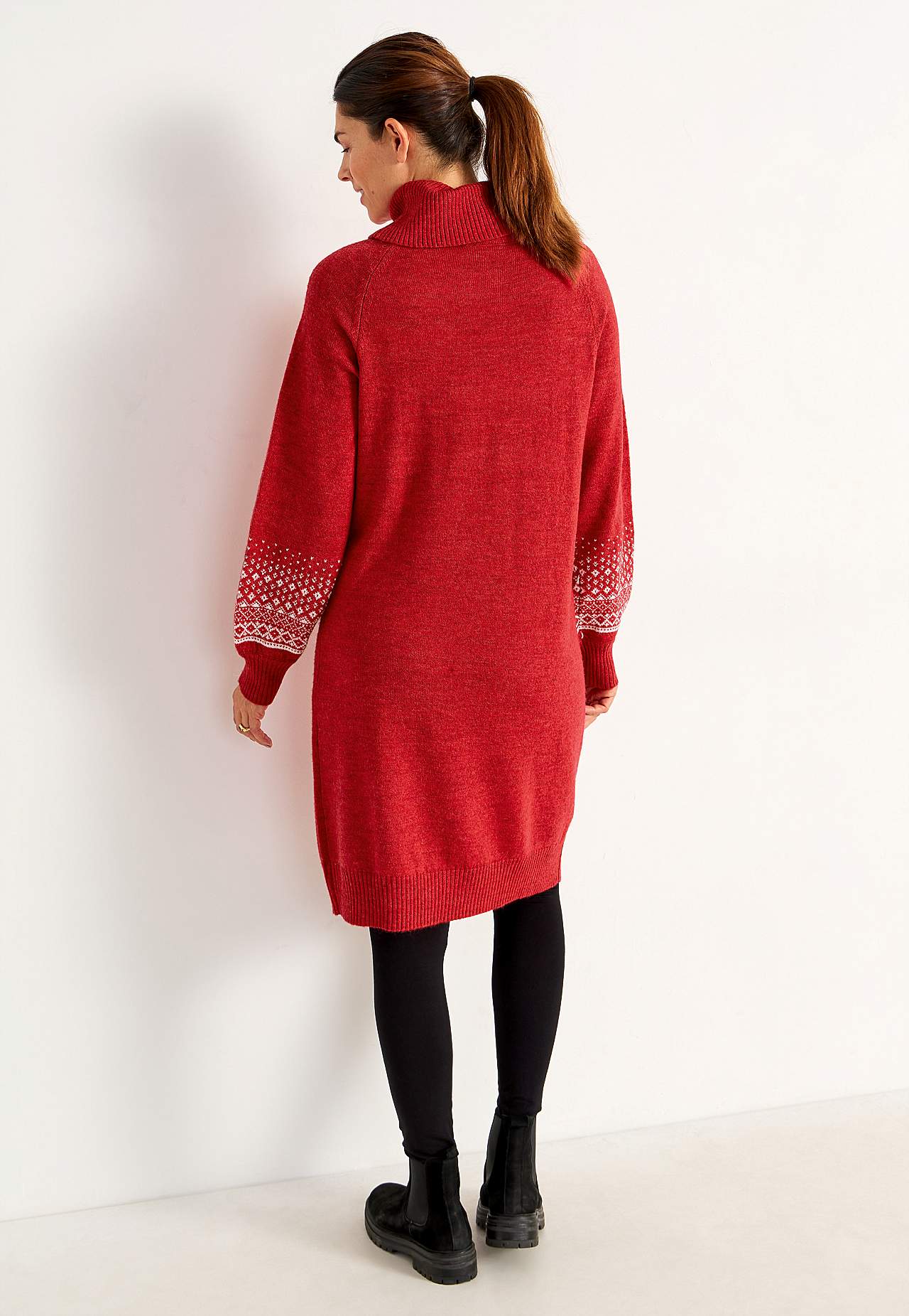 Knitted dress with jacquard patterned sleeves