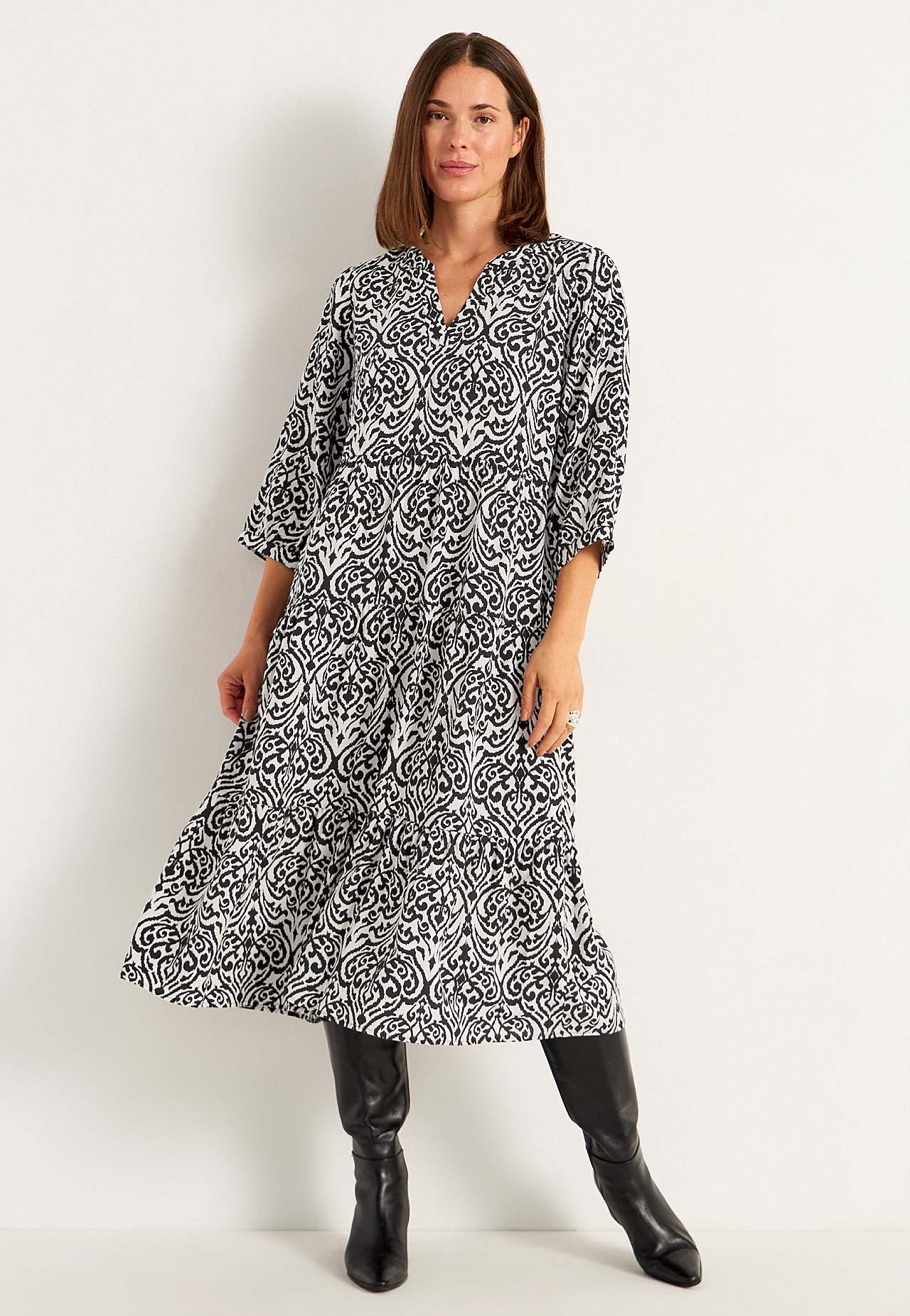 Dress with flounces