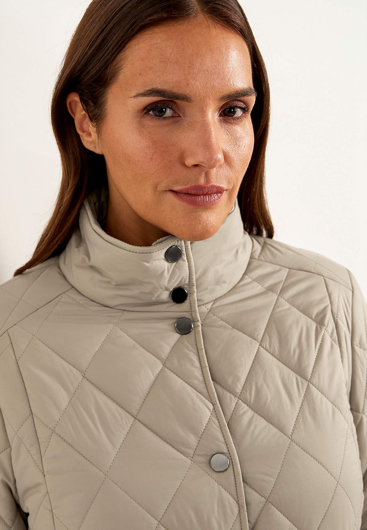 Quilted jacket with snap buttons