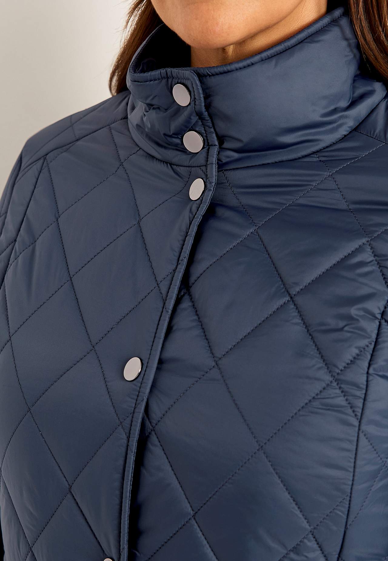 Quilted jacket with snap buttons