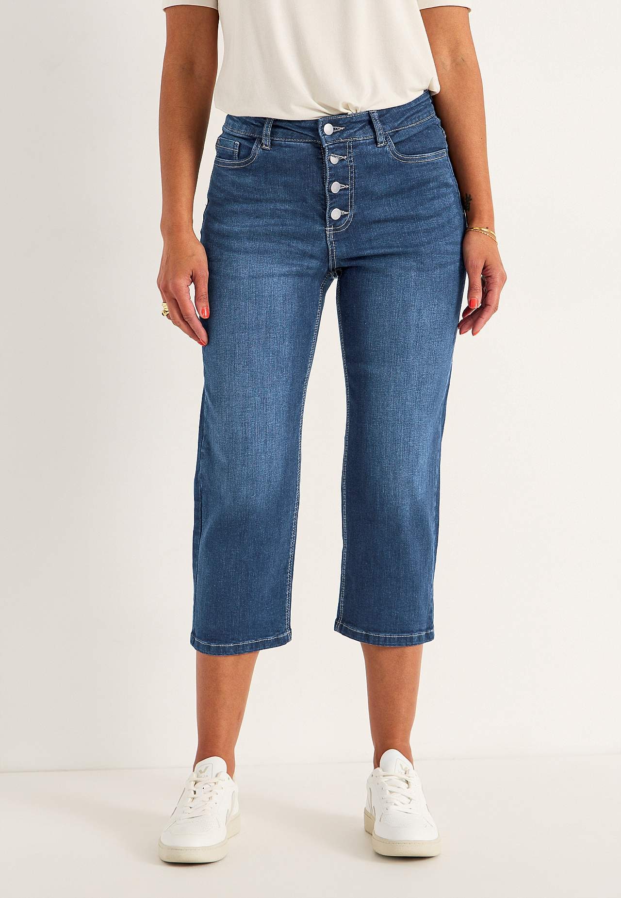 Crop jeans with button fly closure
