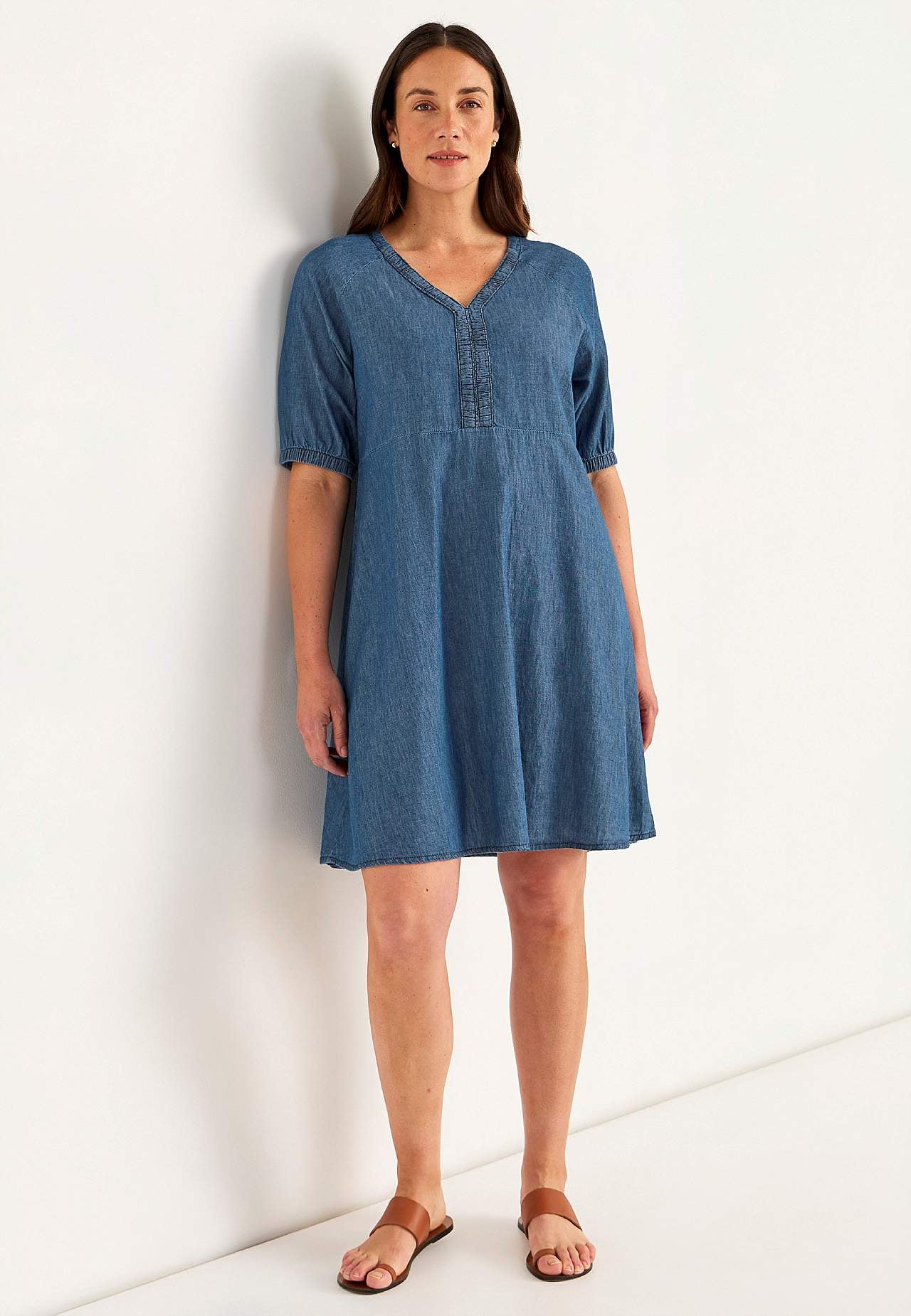 Short denim dress with puff sleeves