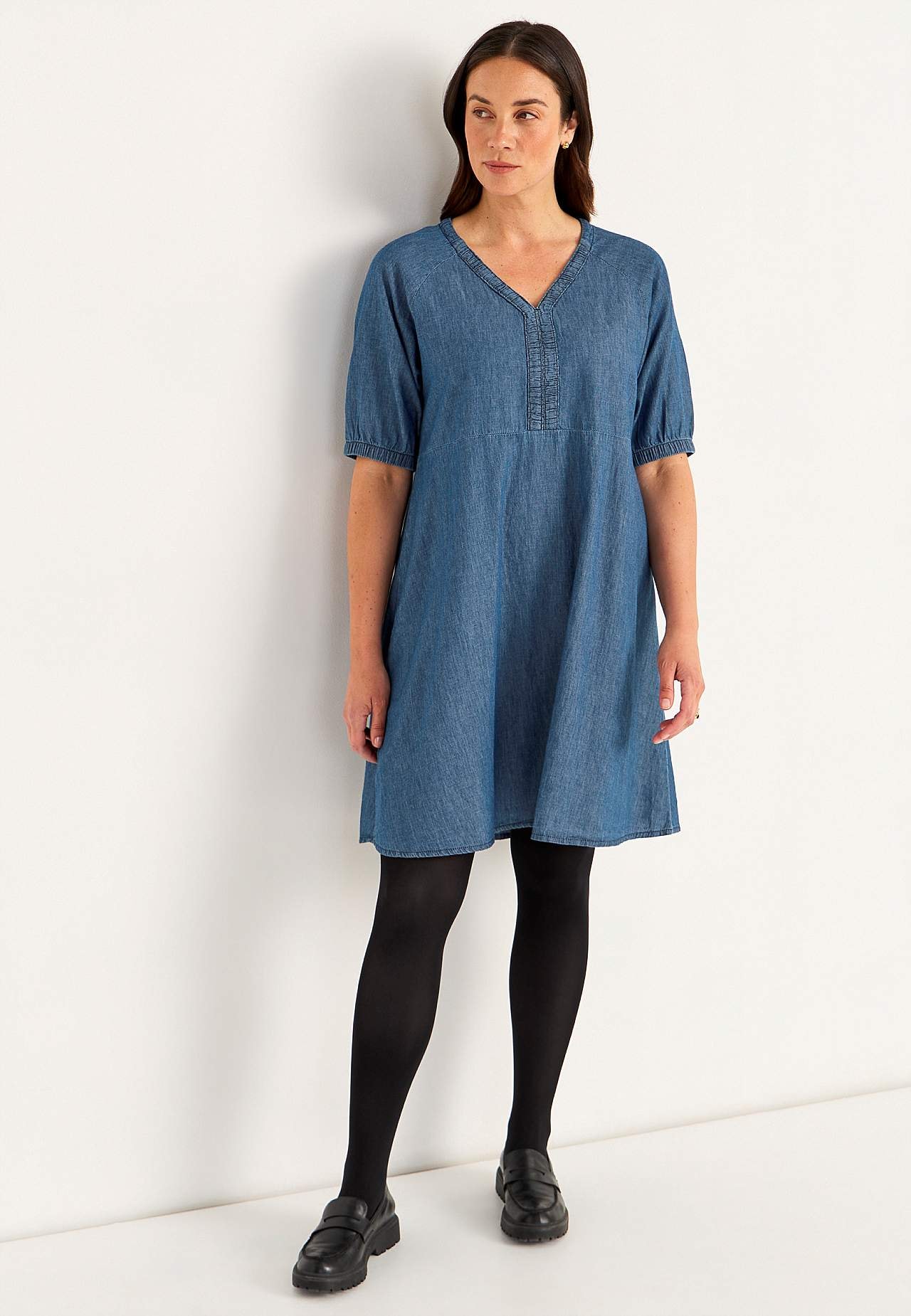 Short denim dress with puff sleeves