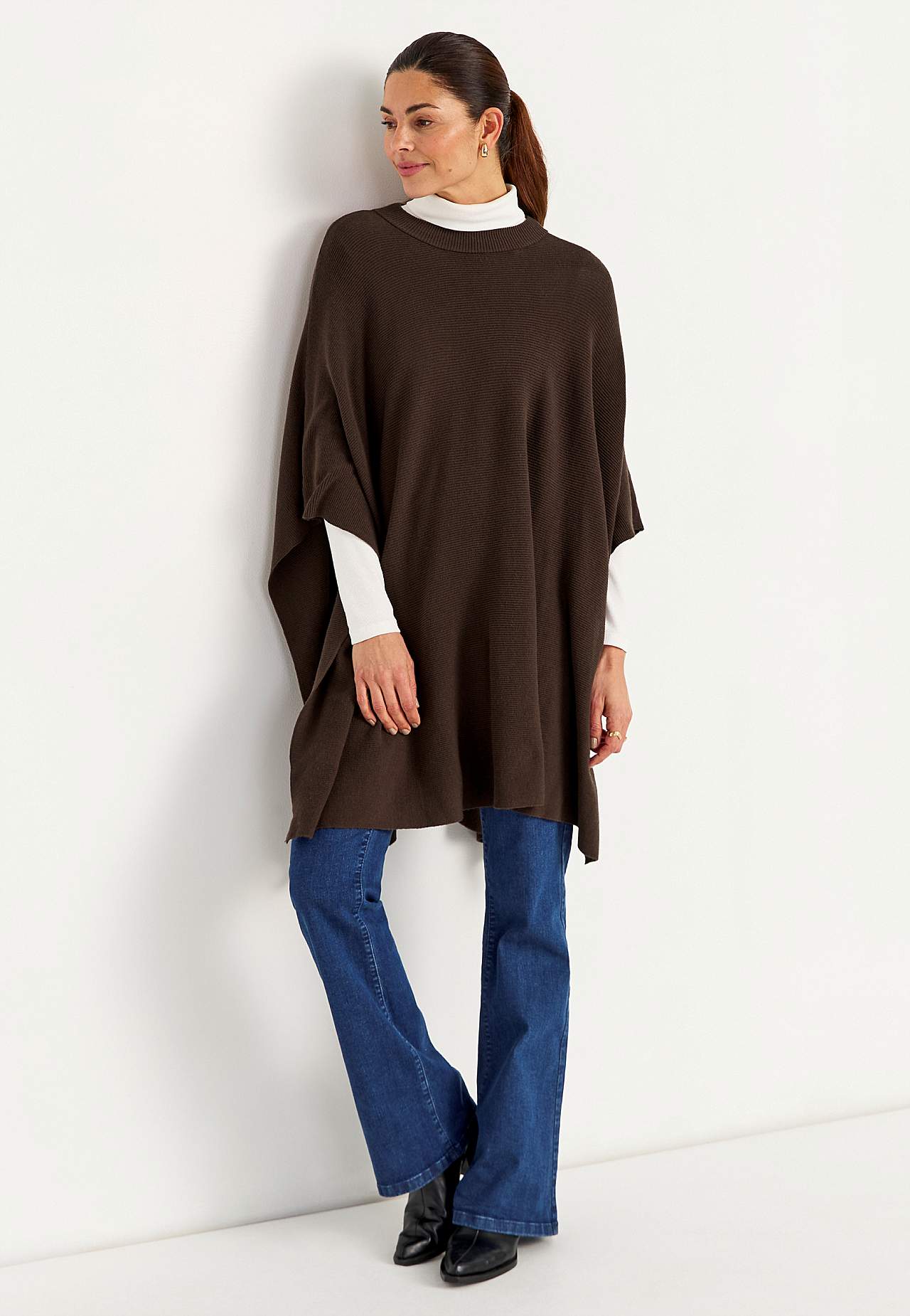 Finstickad poncho