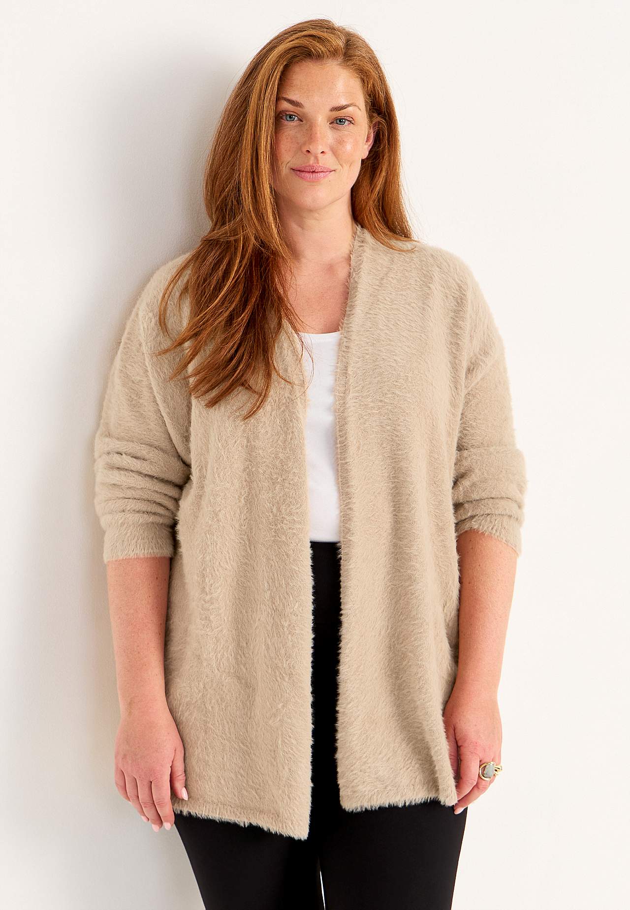 Knitted, open cardigan
