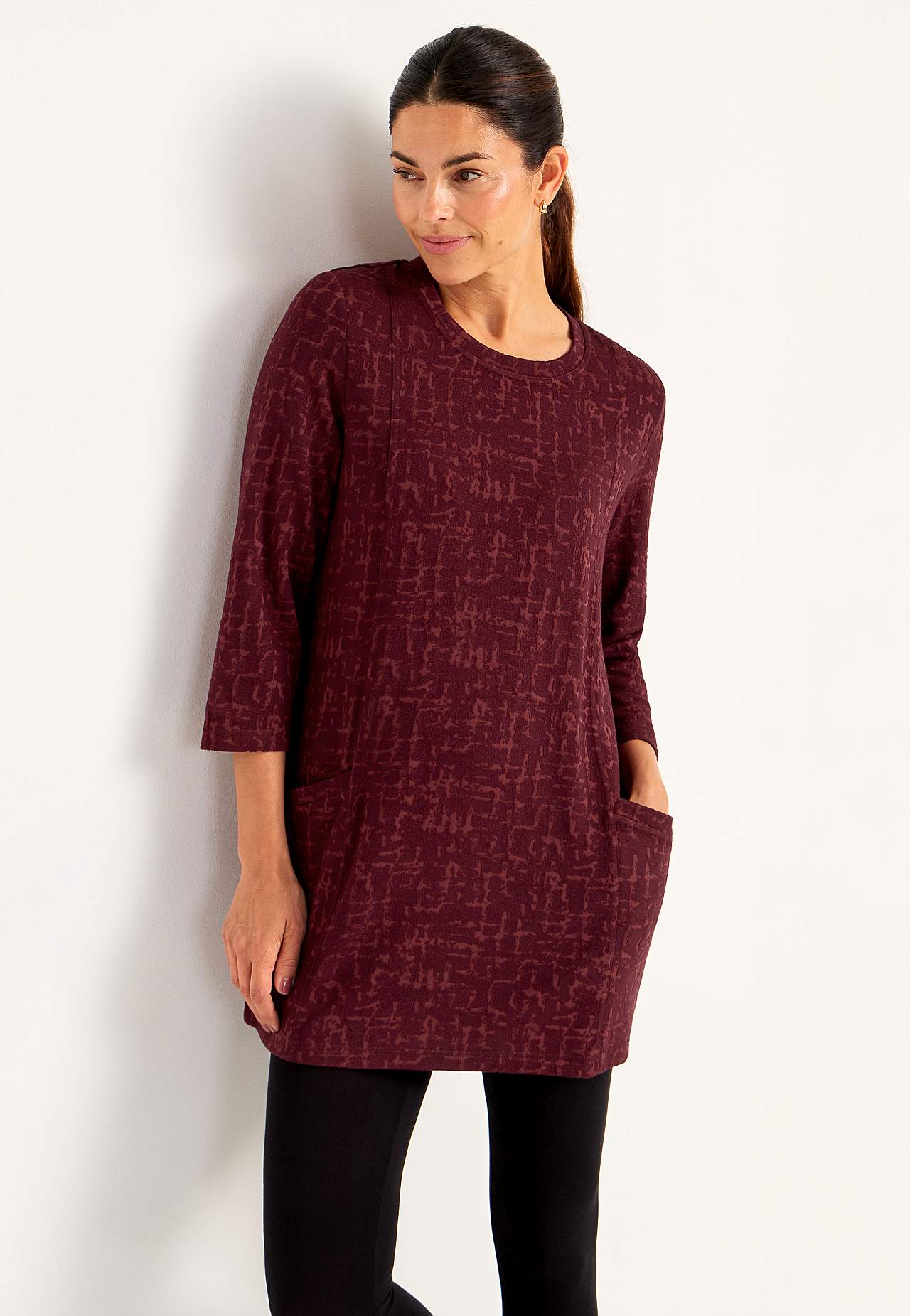 Patterned tunic top with pockets