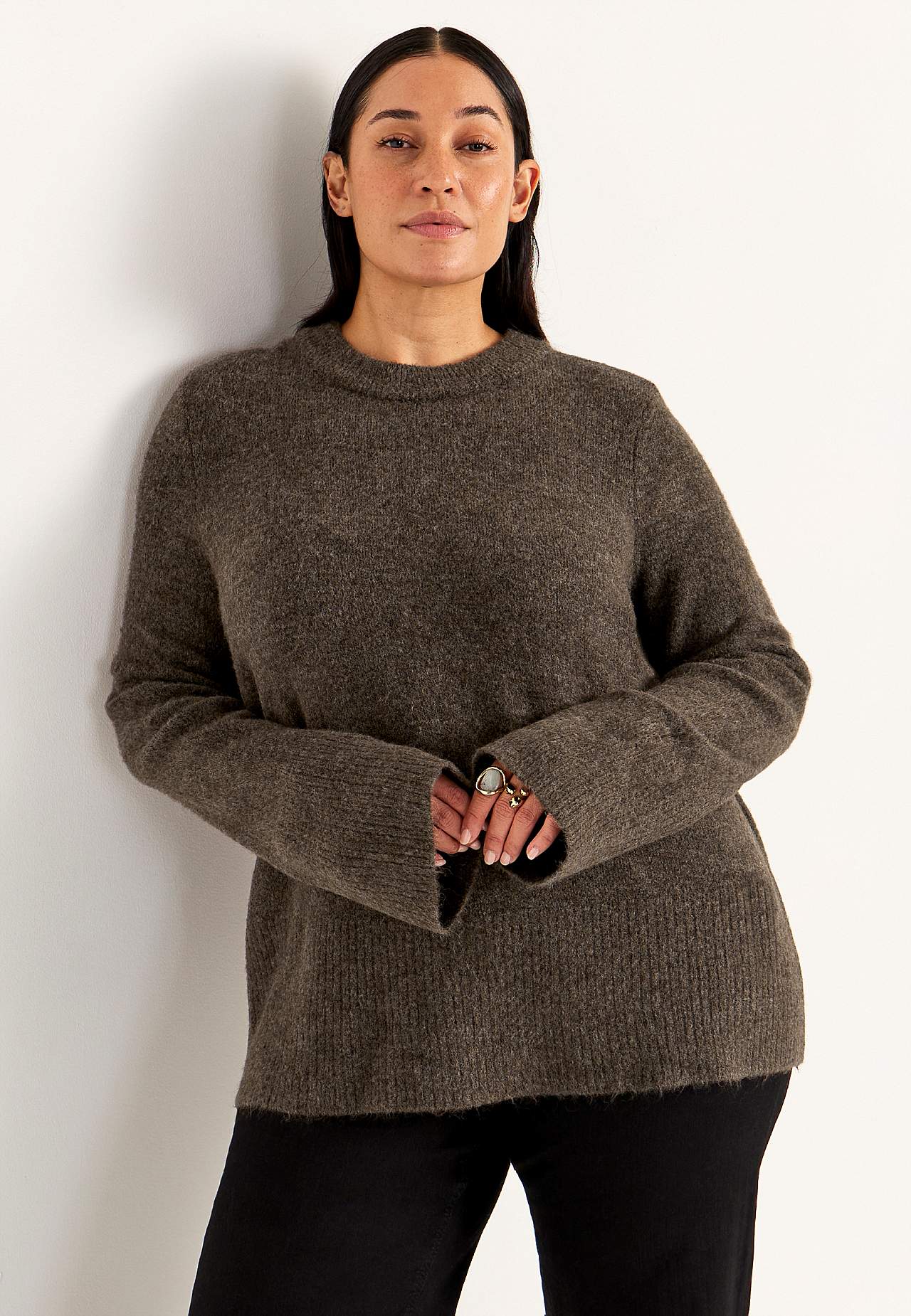 Knitted sweater with round neck