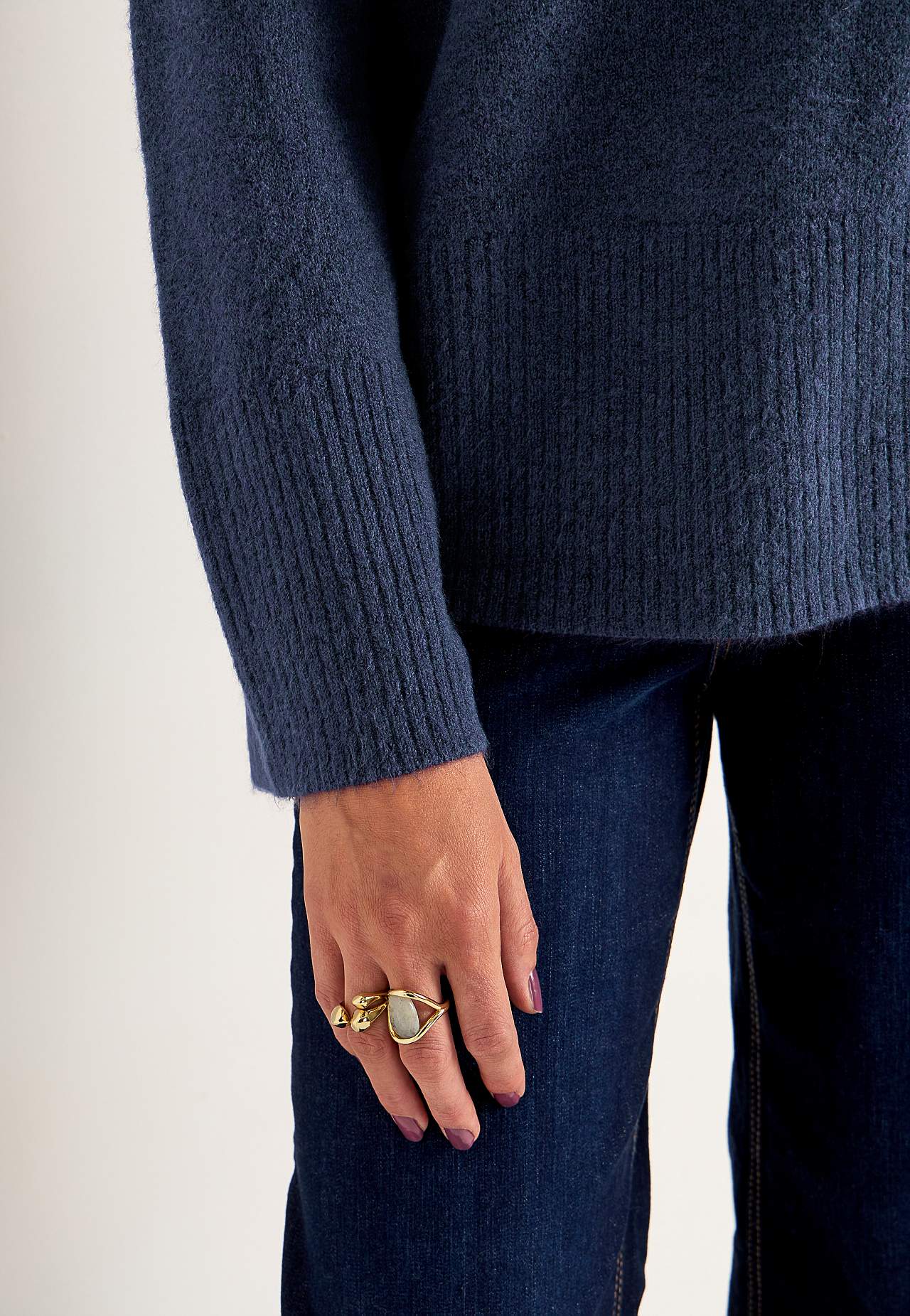 Knitted sweater with round neck