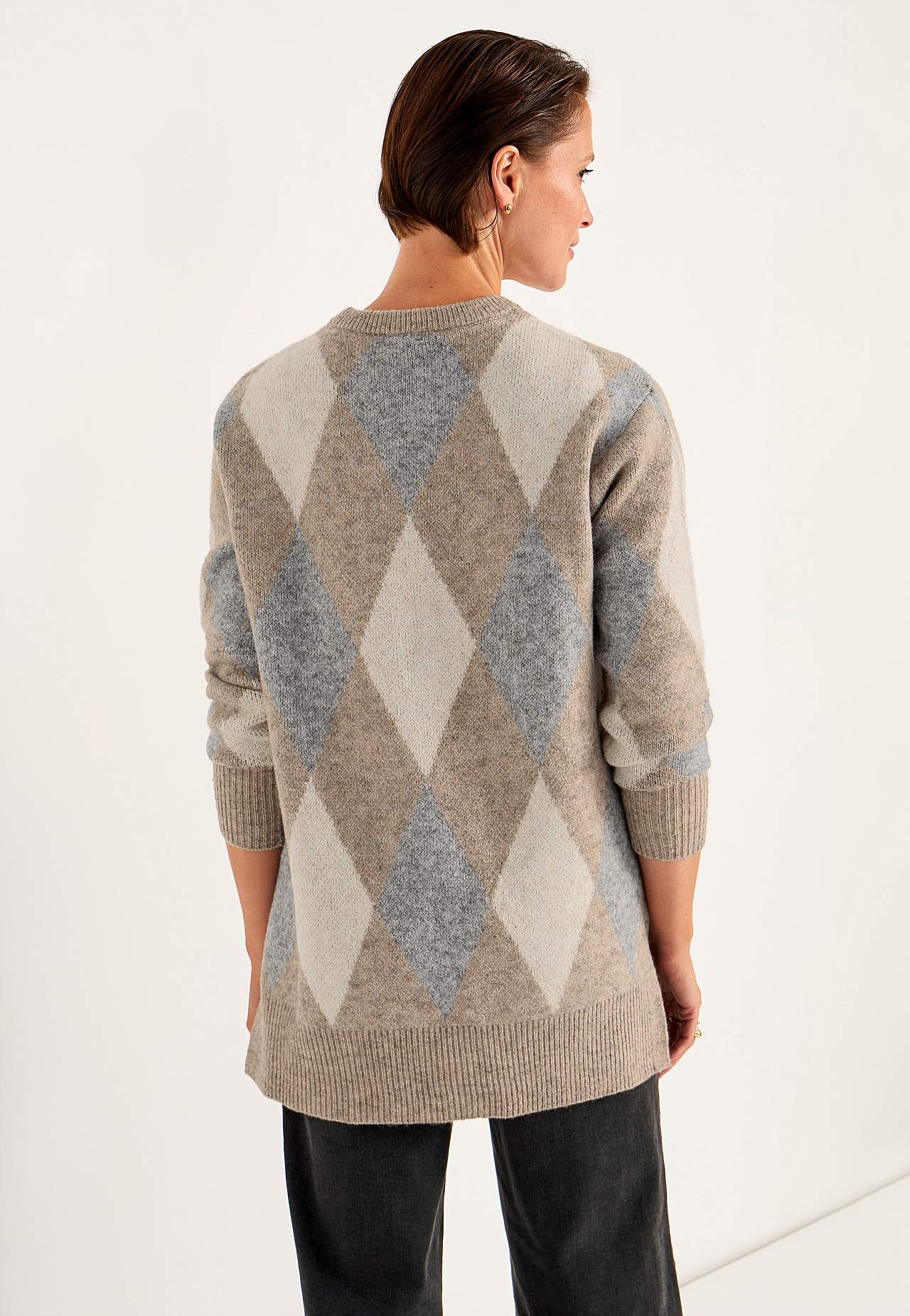 Knitted tunic with slits