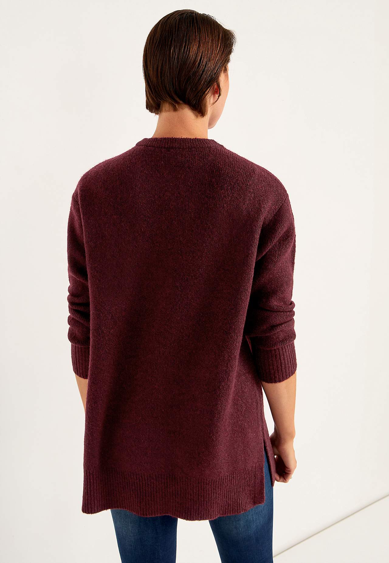 Knitted tunic with slits