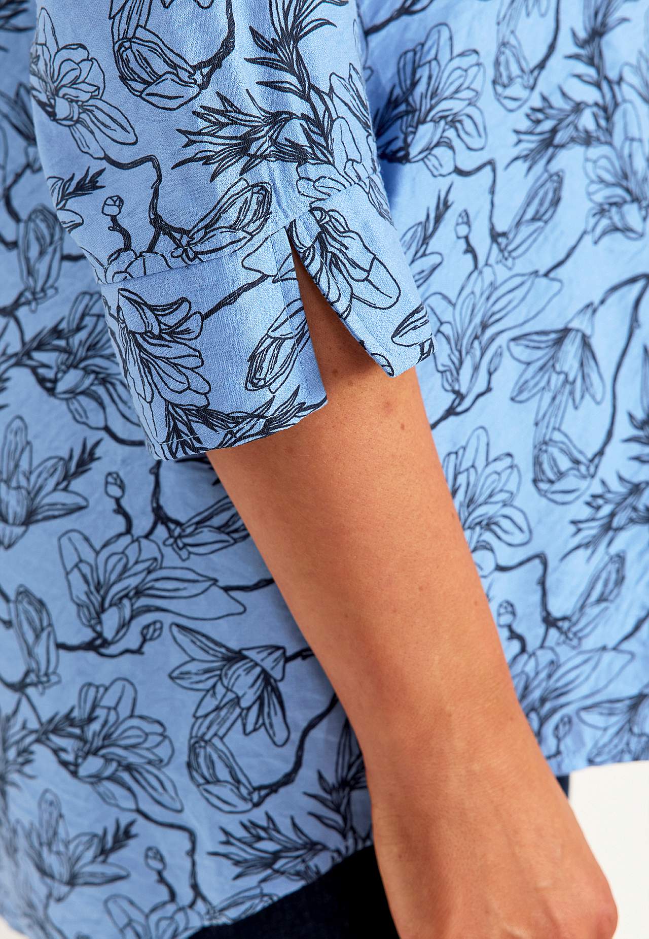 Woven tunic top with pockets