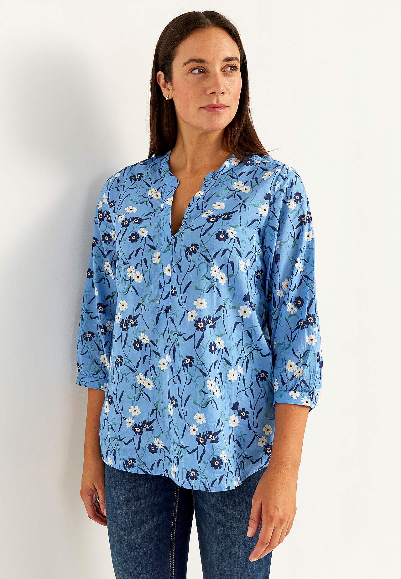 Woven tunic with a flower pattern