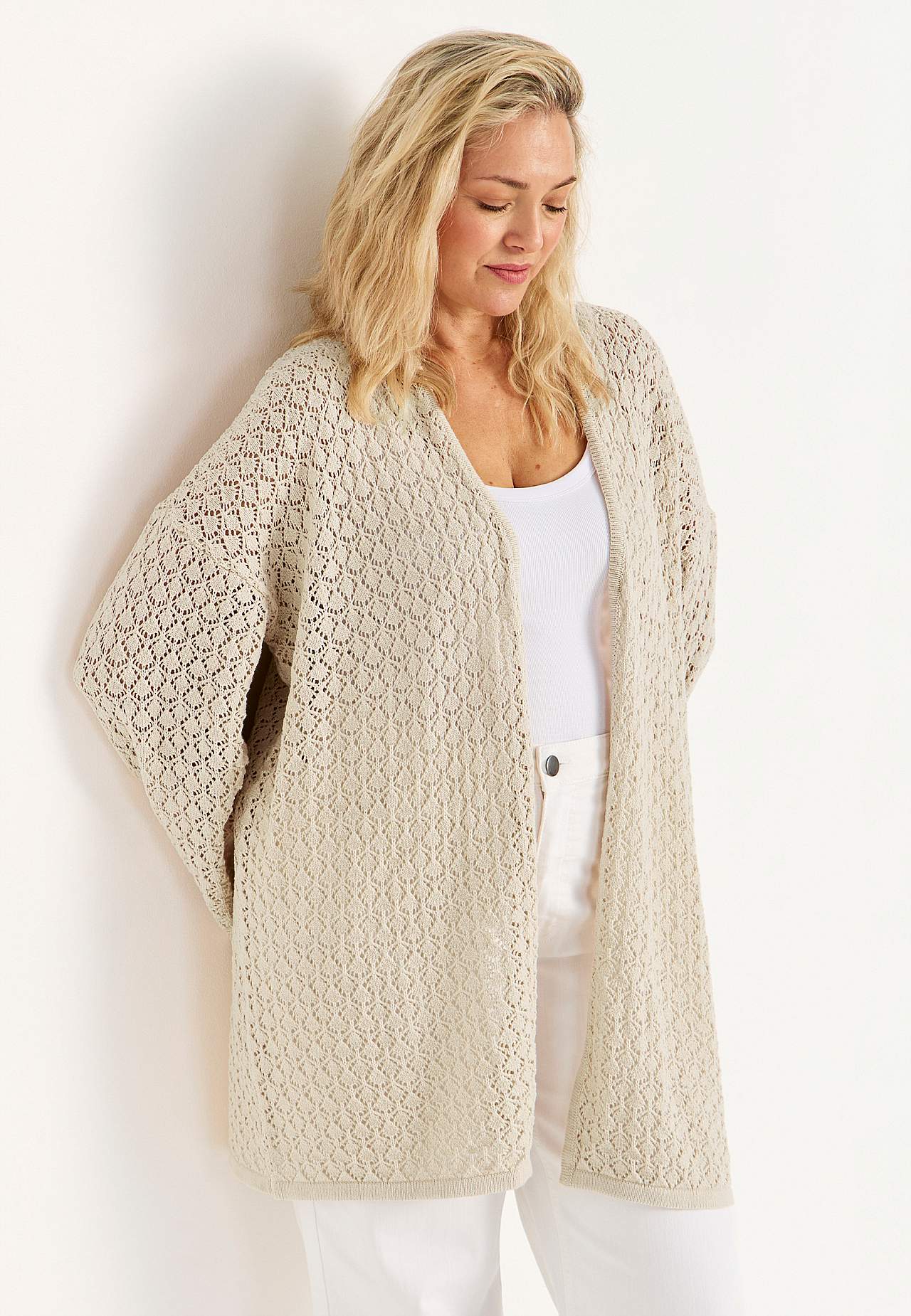 Knitted cardigan with openwork