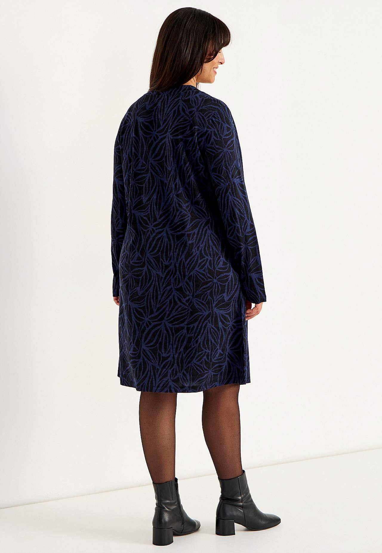 Trikoomekko taskuilla