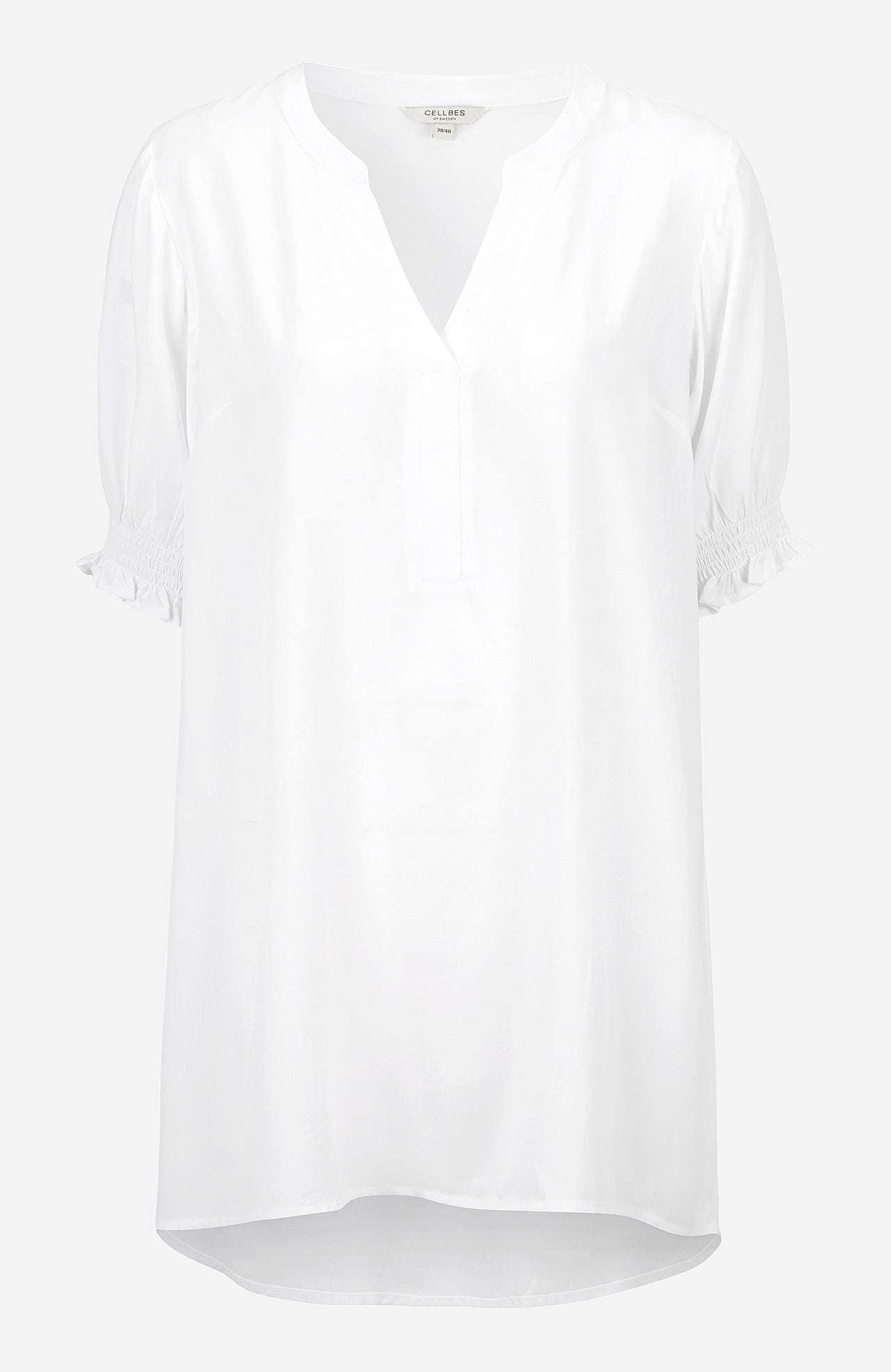 Tunic with smocking on the sleeve ends