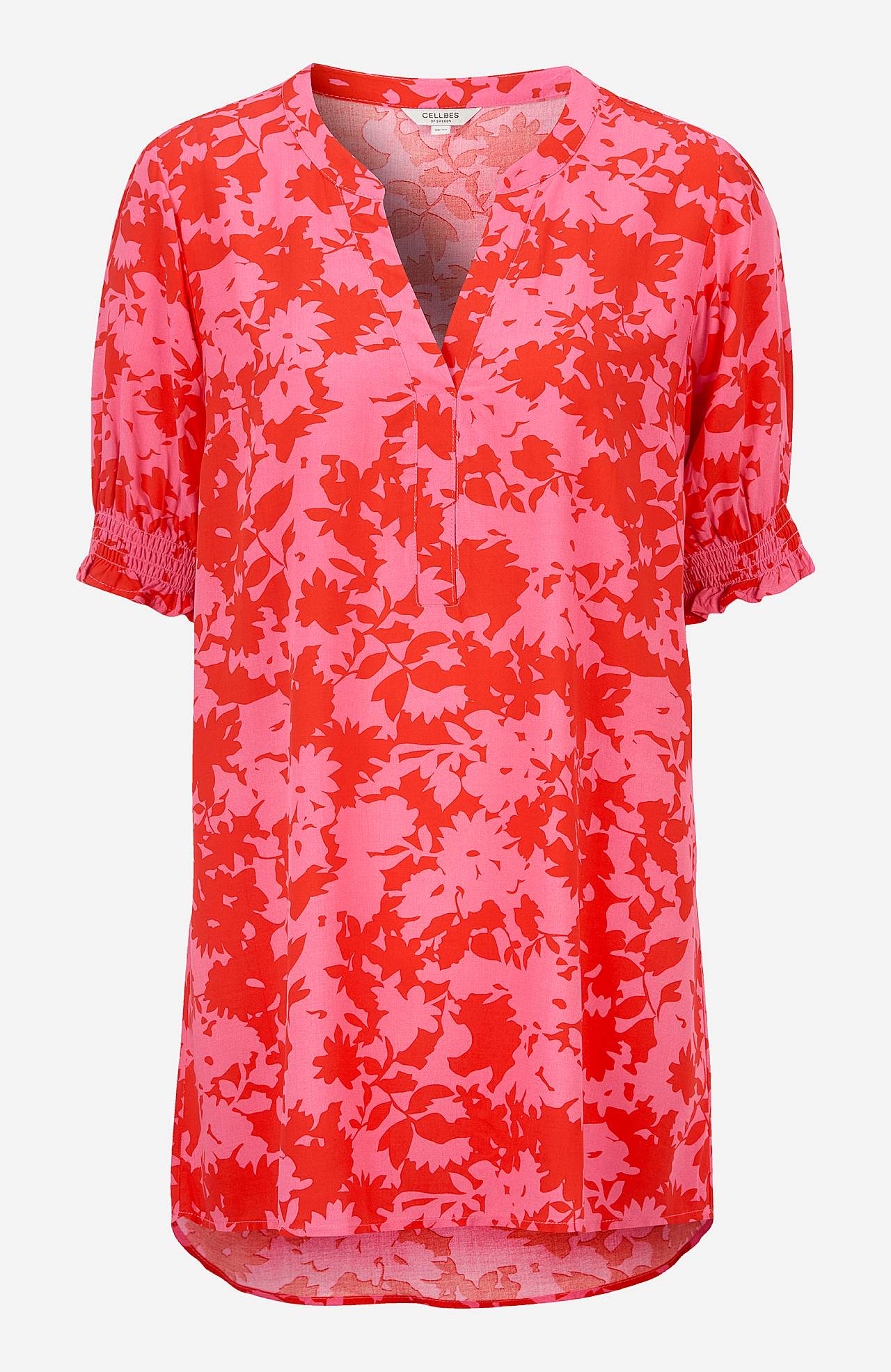 Tunic with smocking on the sleeve ends